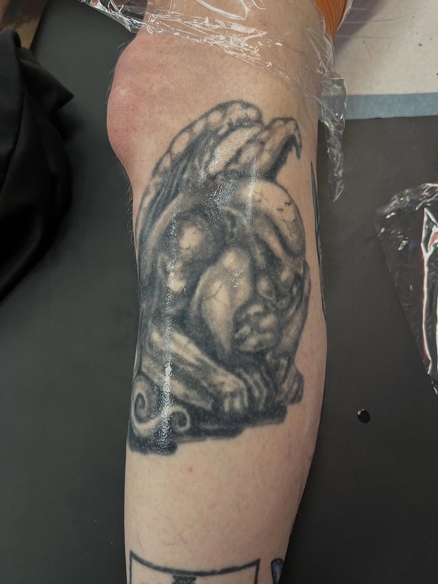 Gargoyle realism tattoo on the forearm by Lee Brewster, Erlanger, Kentucky