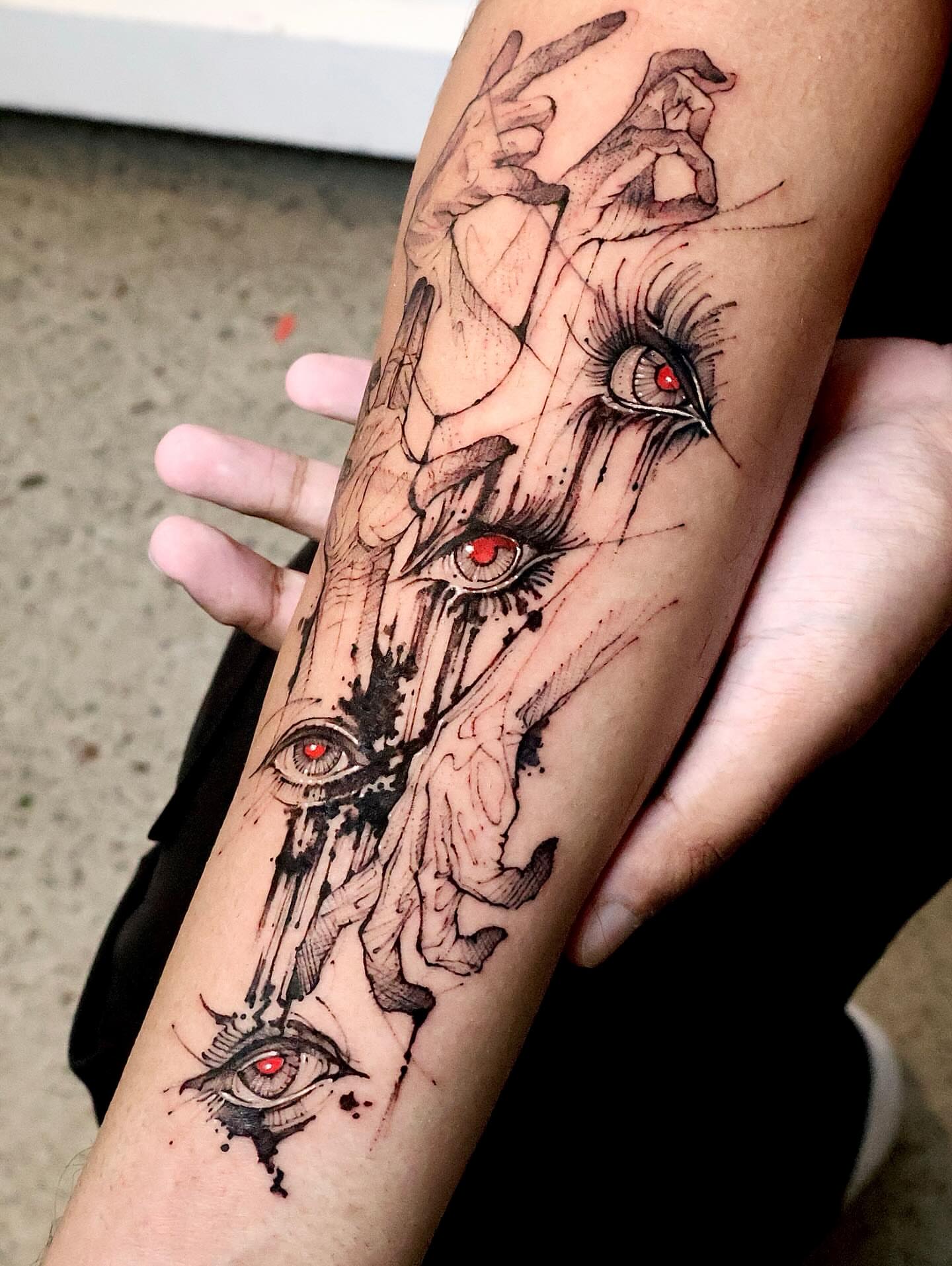 Eyes dark realism tattoo on the forearm by Tadi