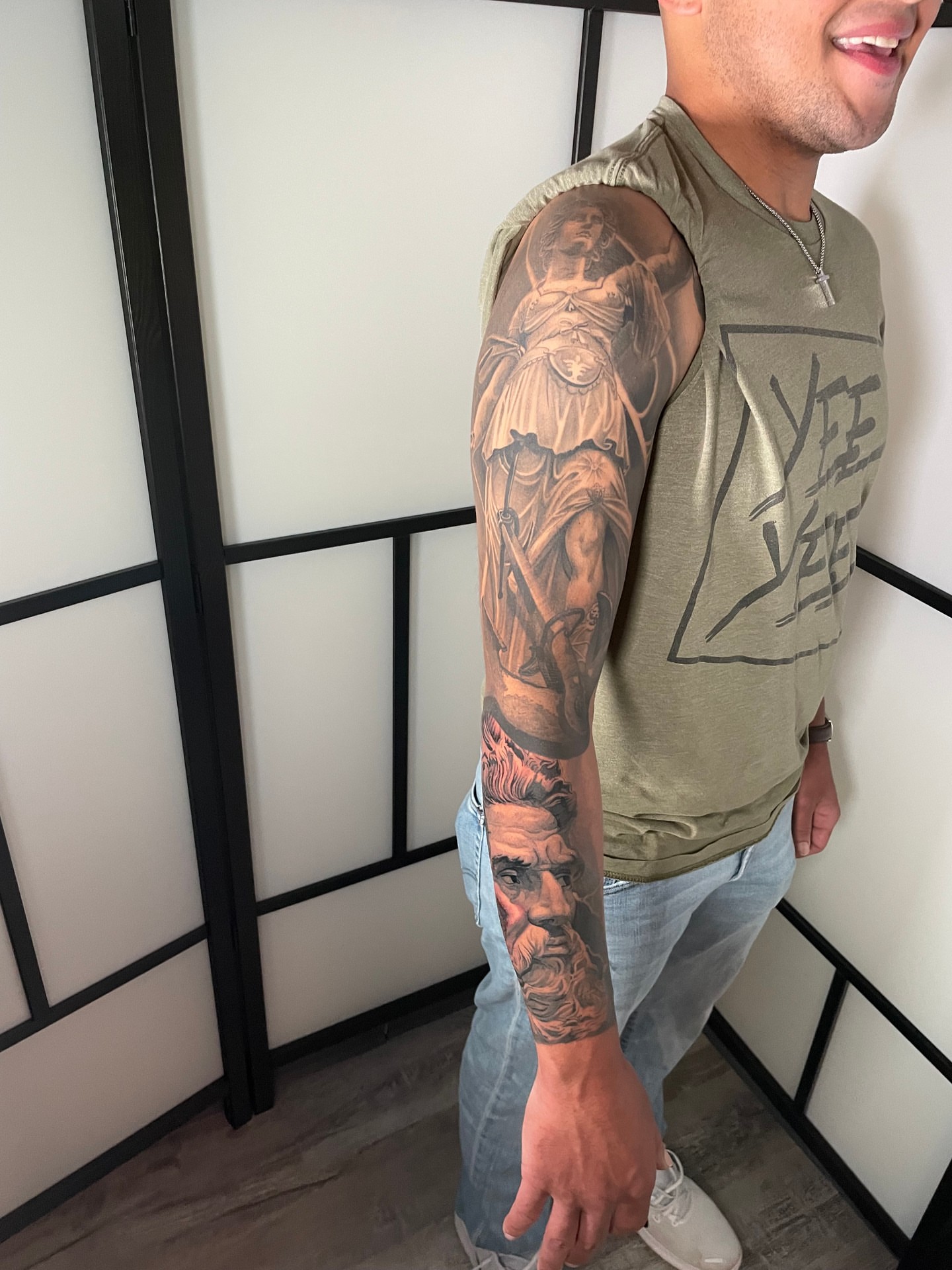 Statue realism tattoo on the upper arm by Sirvonesmithtattoos@gmail.com