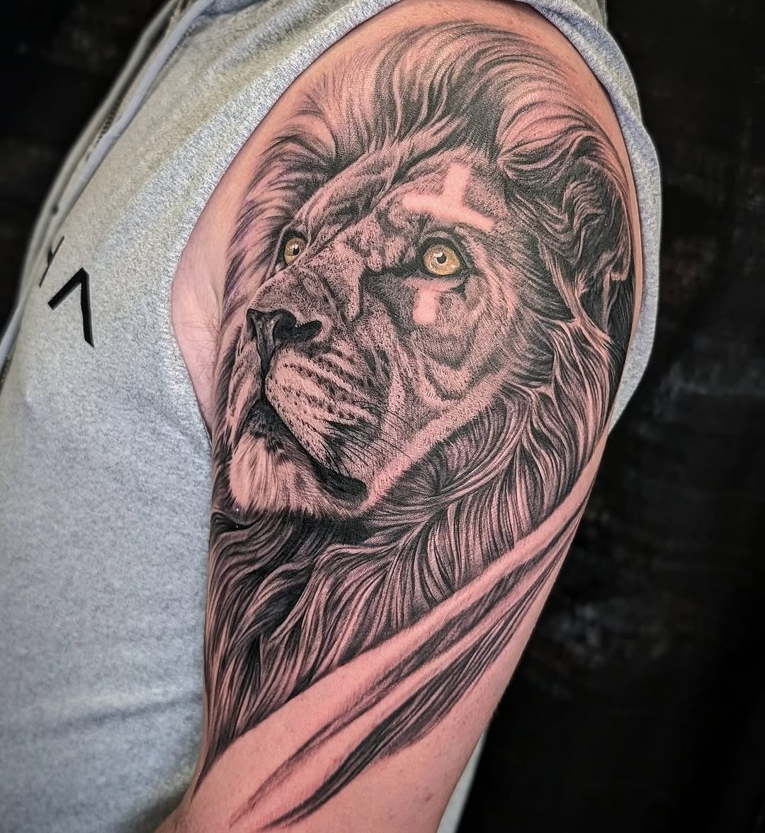 Lion portrait realism tattoo on the shoulder by Will Alexander, Lombard, Illinois