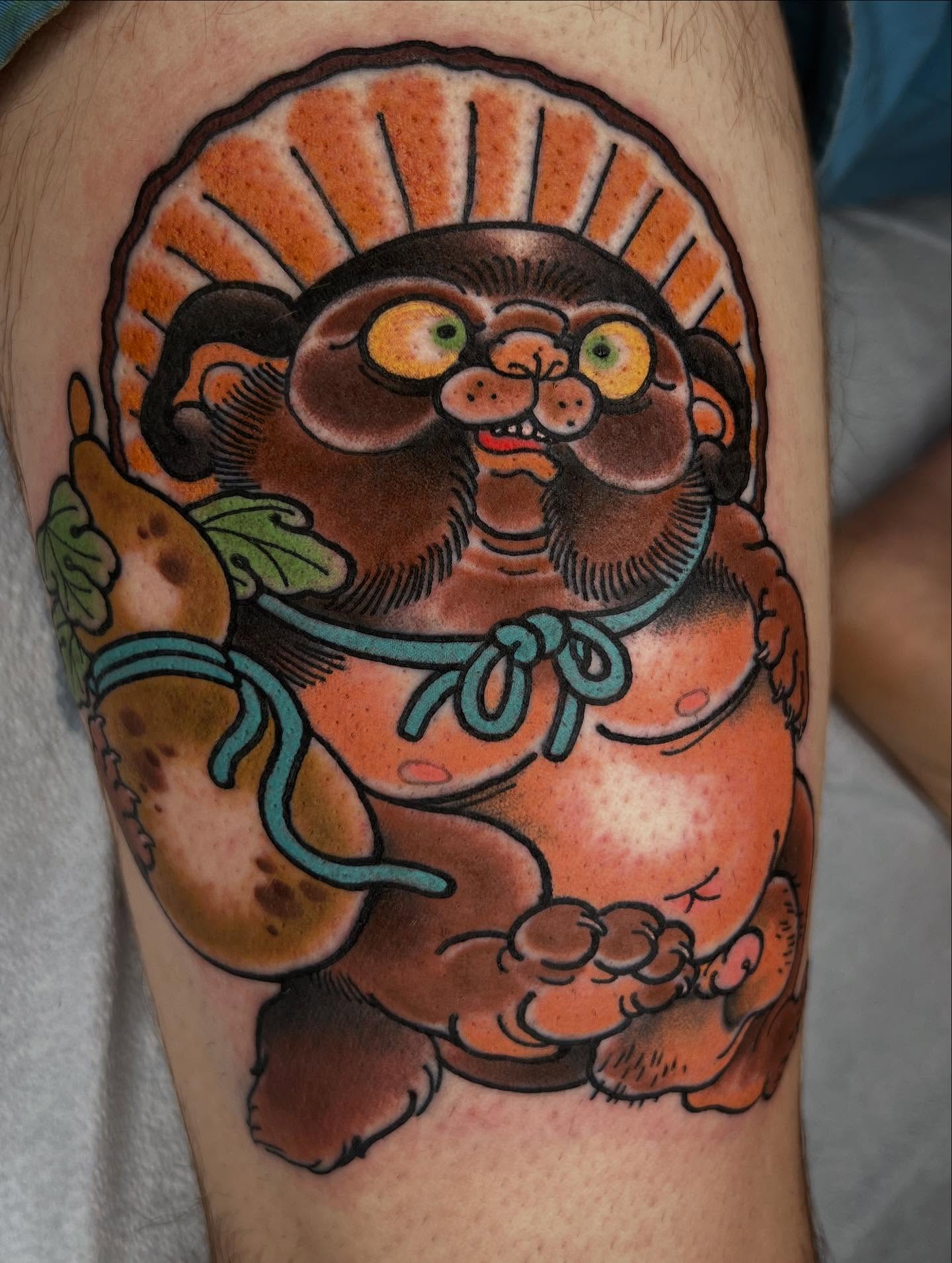 Tanuki American traditional tattoo on the forearm by Troy David Souders