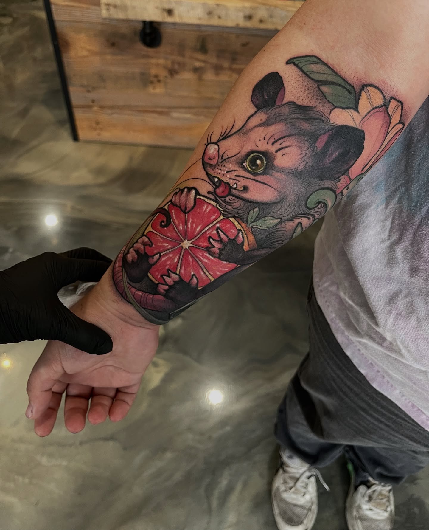 Mouse and grapefruit American traditional tattoo on the forearm by ceci✨, Edinburg, Texas