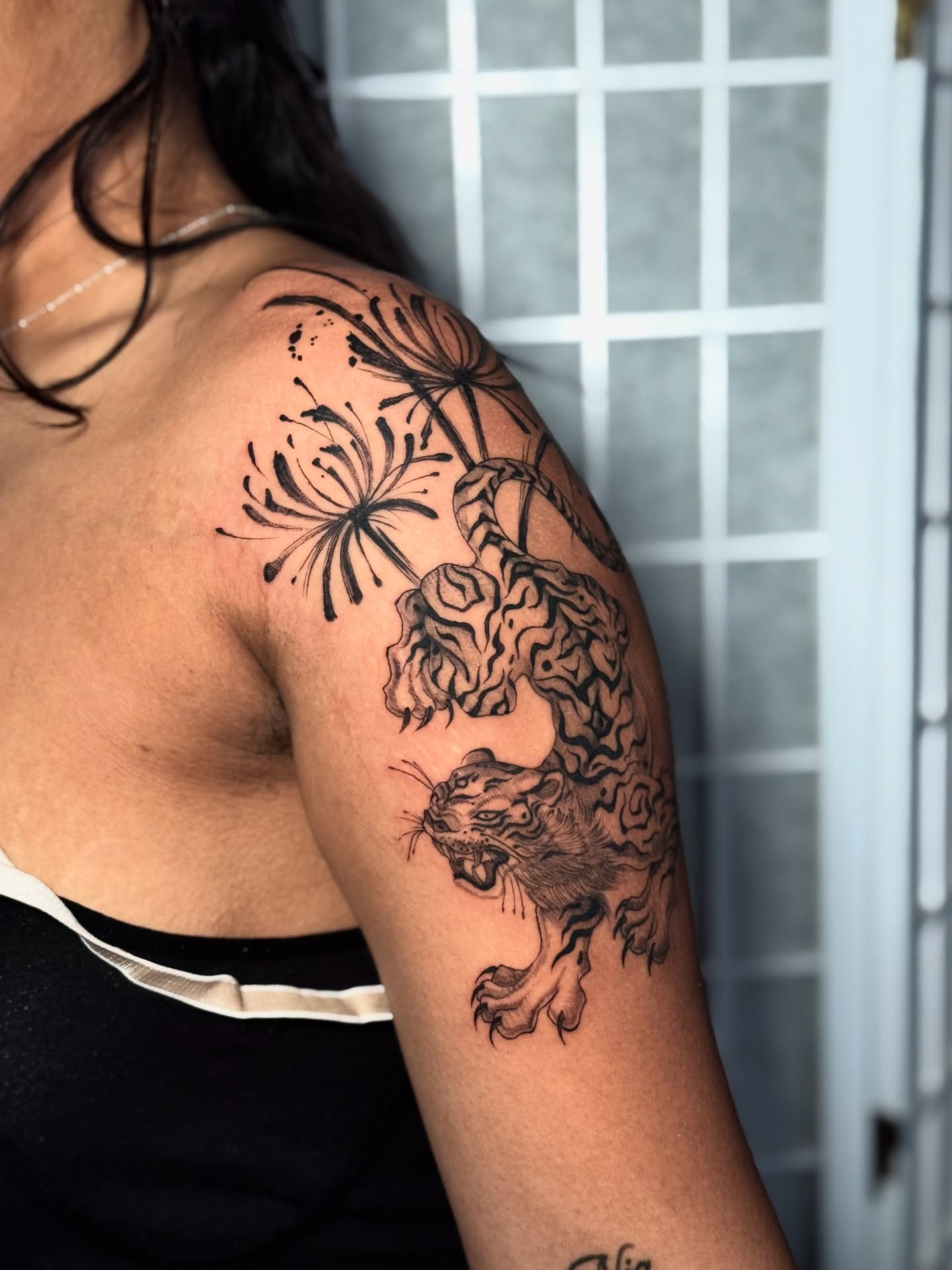 Lion and dandelion realism tattoo on the shoulder by Kbtattz