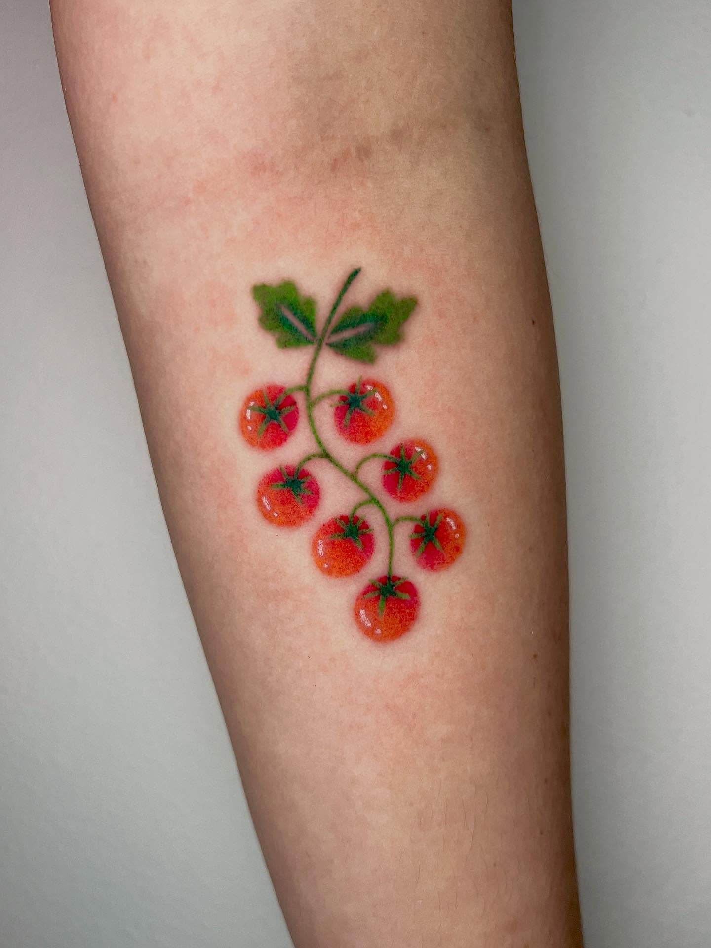 Tomato cluster realism tattoo on the forearm by AJ π°π· LA tattoo