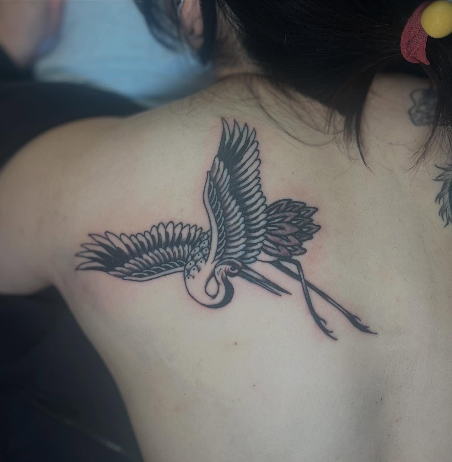Flamingo black and grey tattoo on the back by Ryan Kim