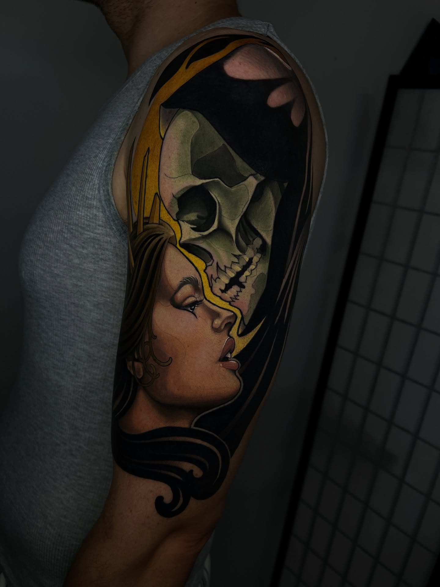 Woman and skull realism tattoo on the forearm by Neotrav Tattoos