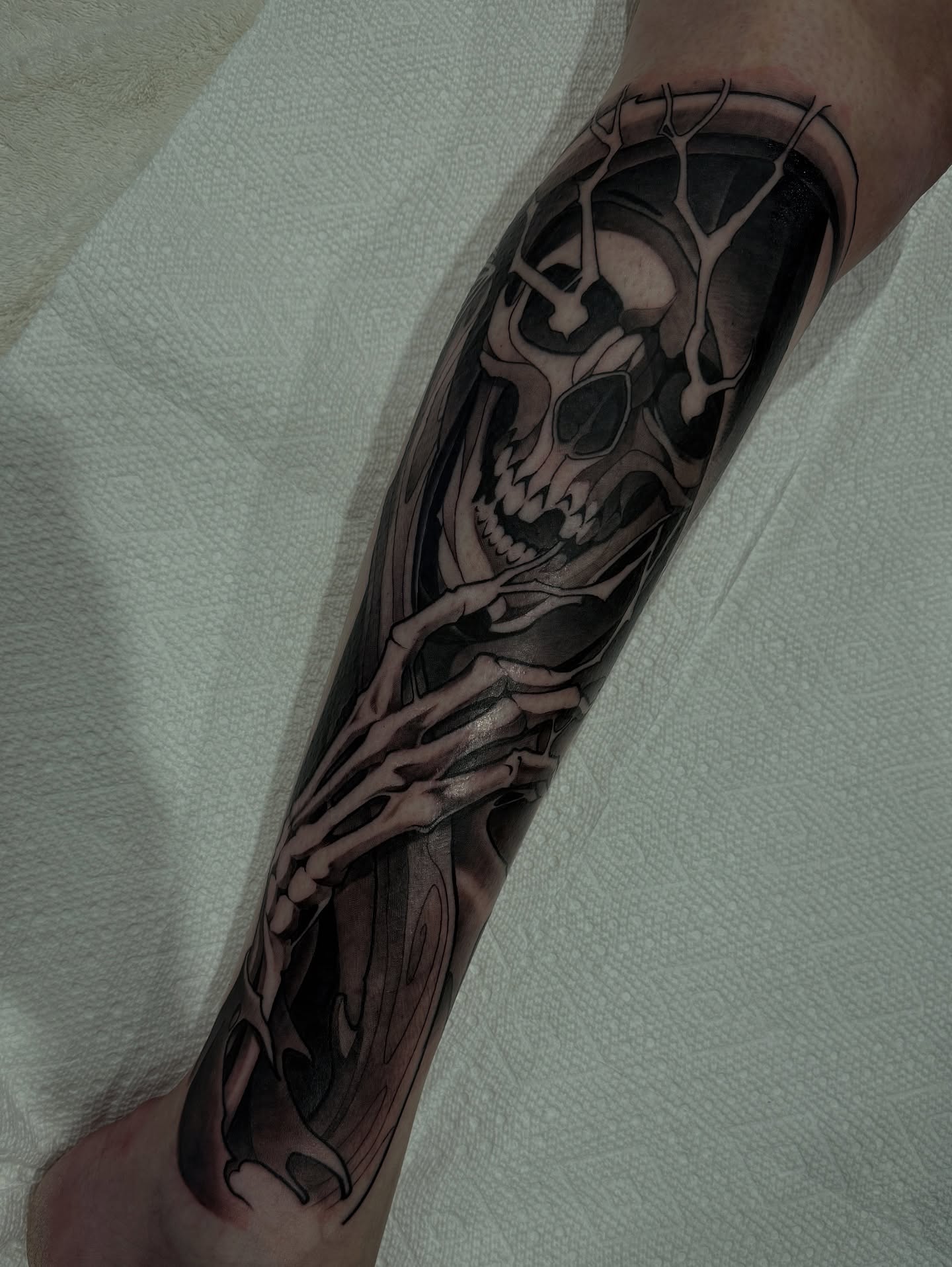 Skull realism tattoo on the forearm by Neotrav Tattoos