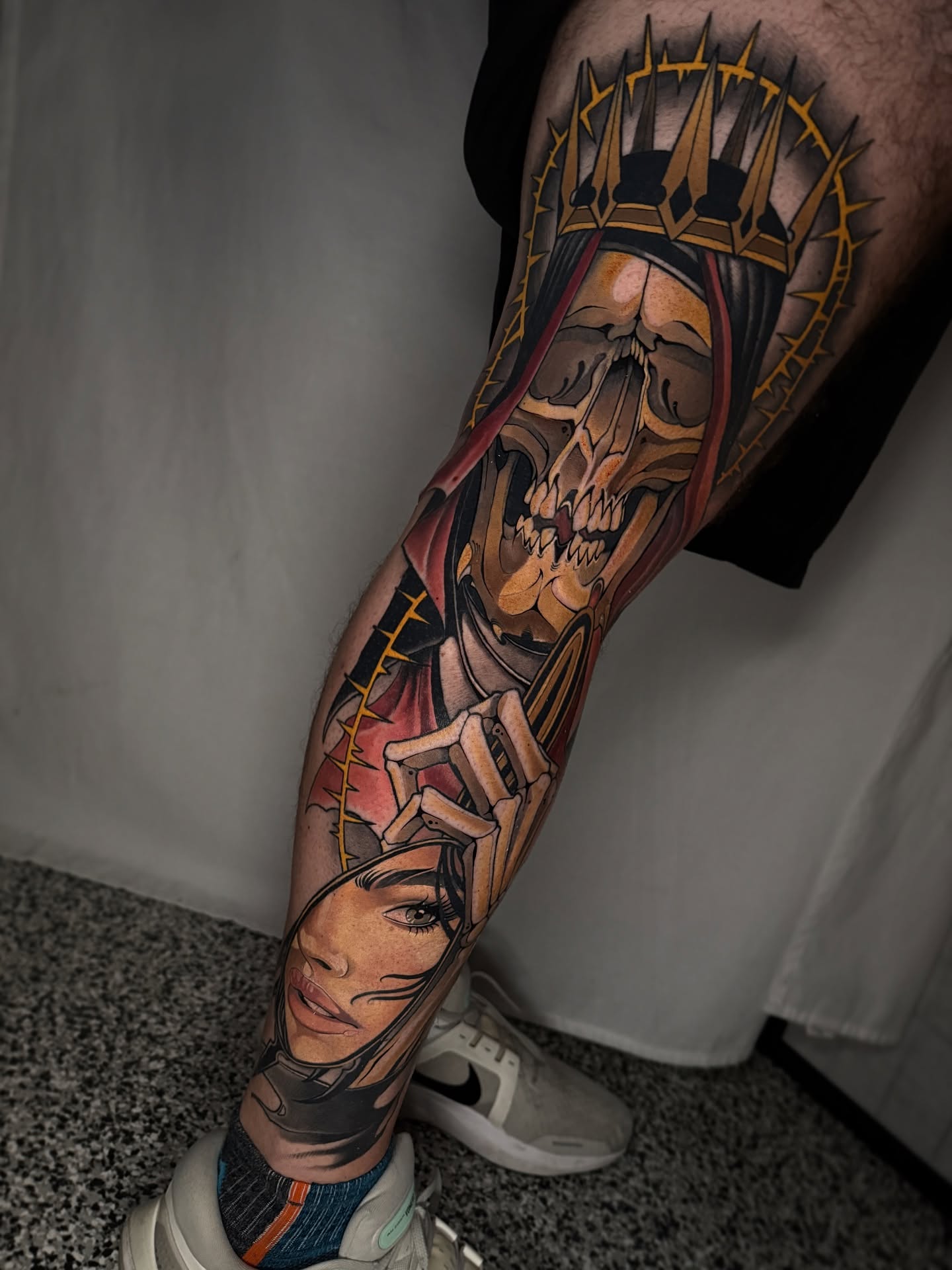 Skull and woman realism tattoo on the forearm by Neotrav Tattoos