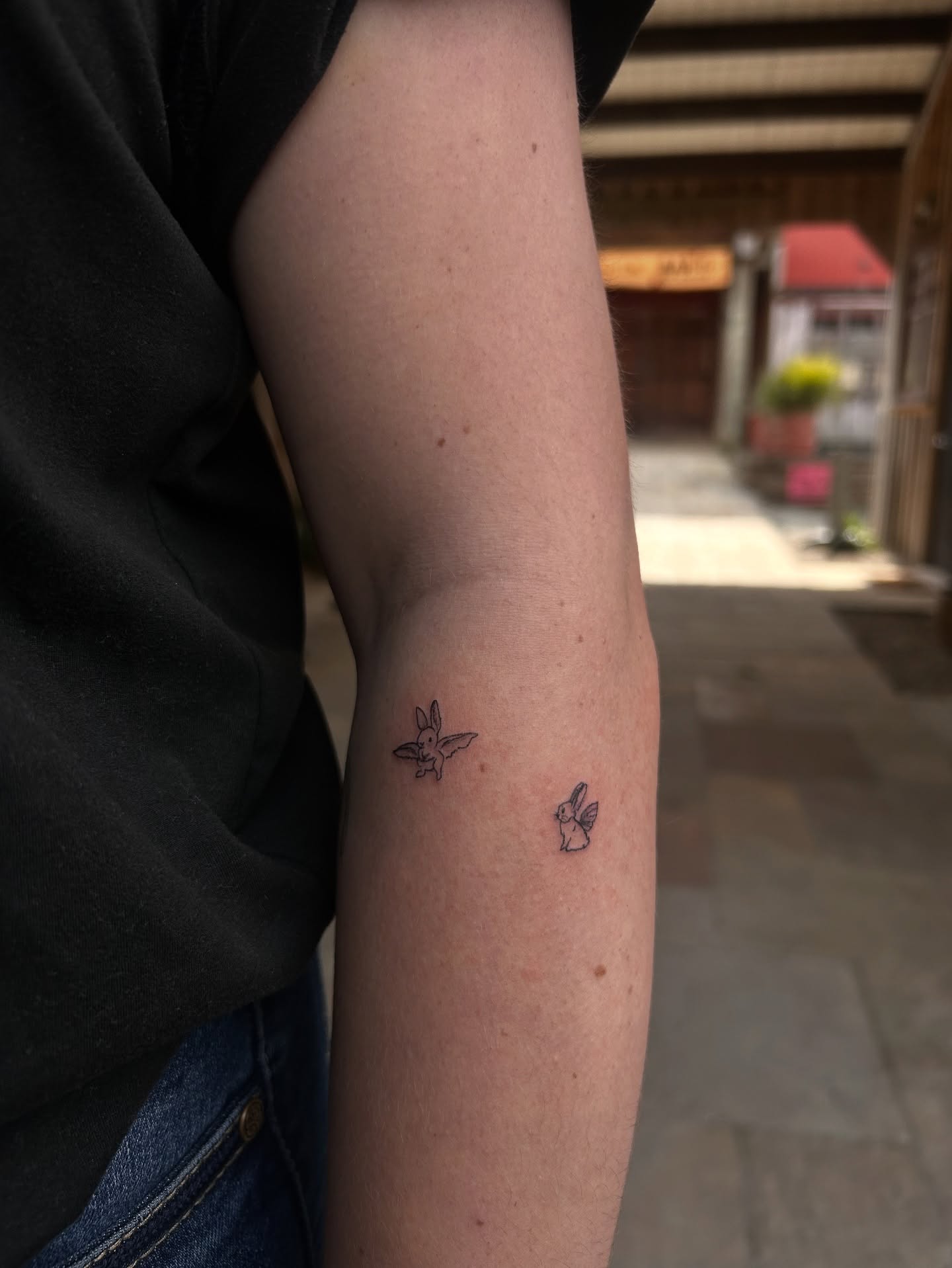 Bunny black and grey tattoo on the forearm by Amara Lyons, Matakana, New Zealand