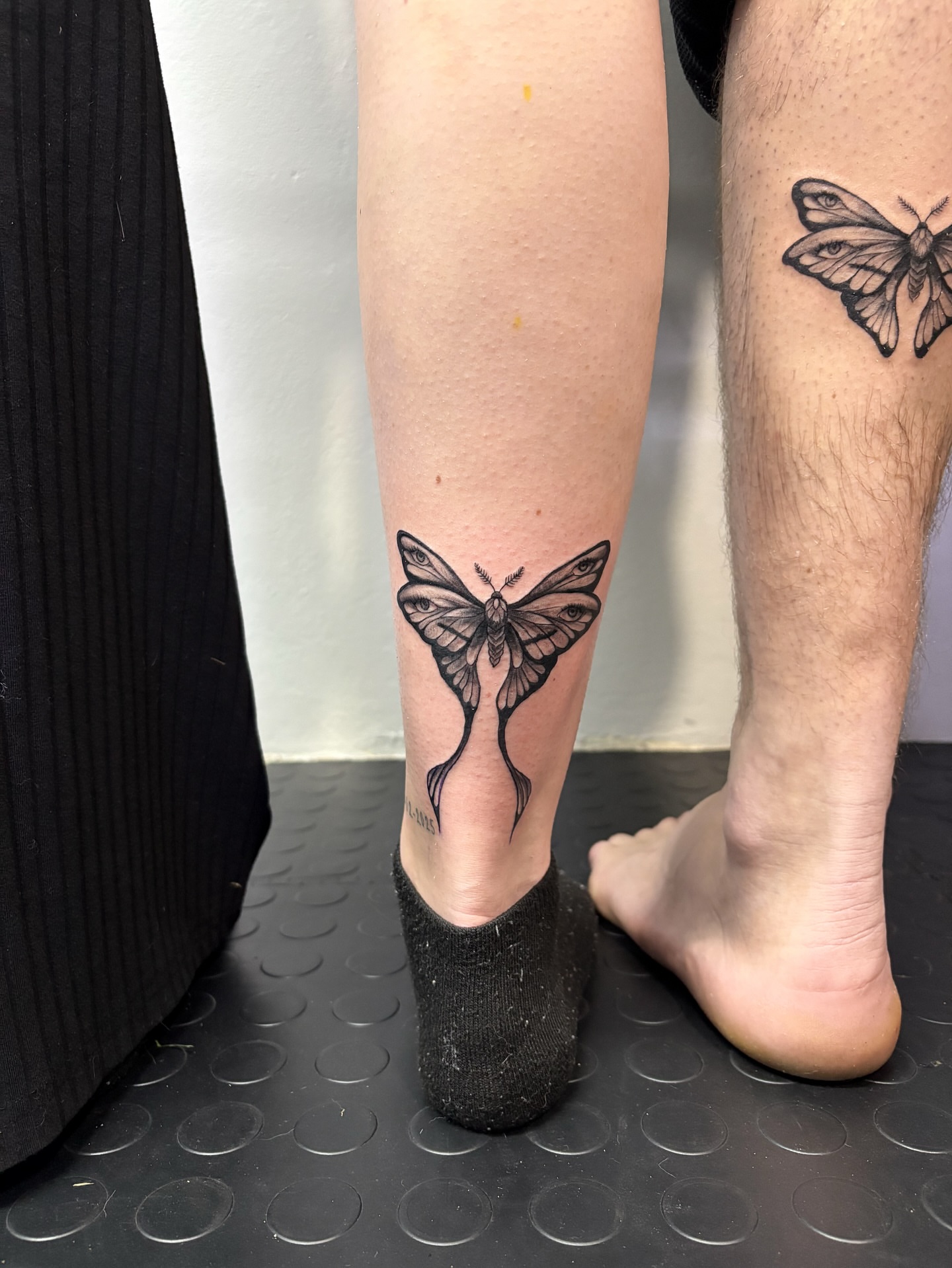 Butterfly black and grey tattoo on the leg by Art by Aimee