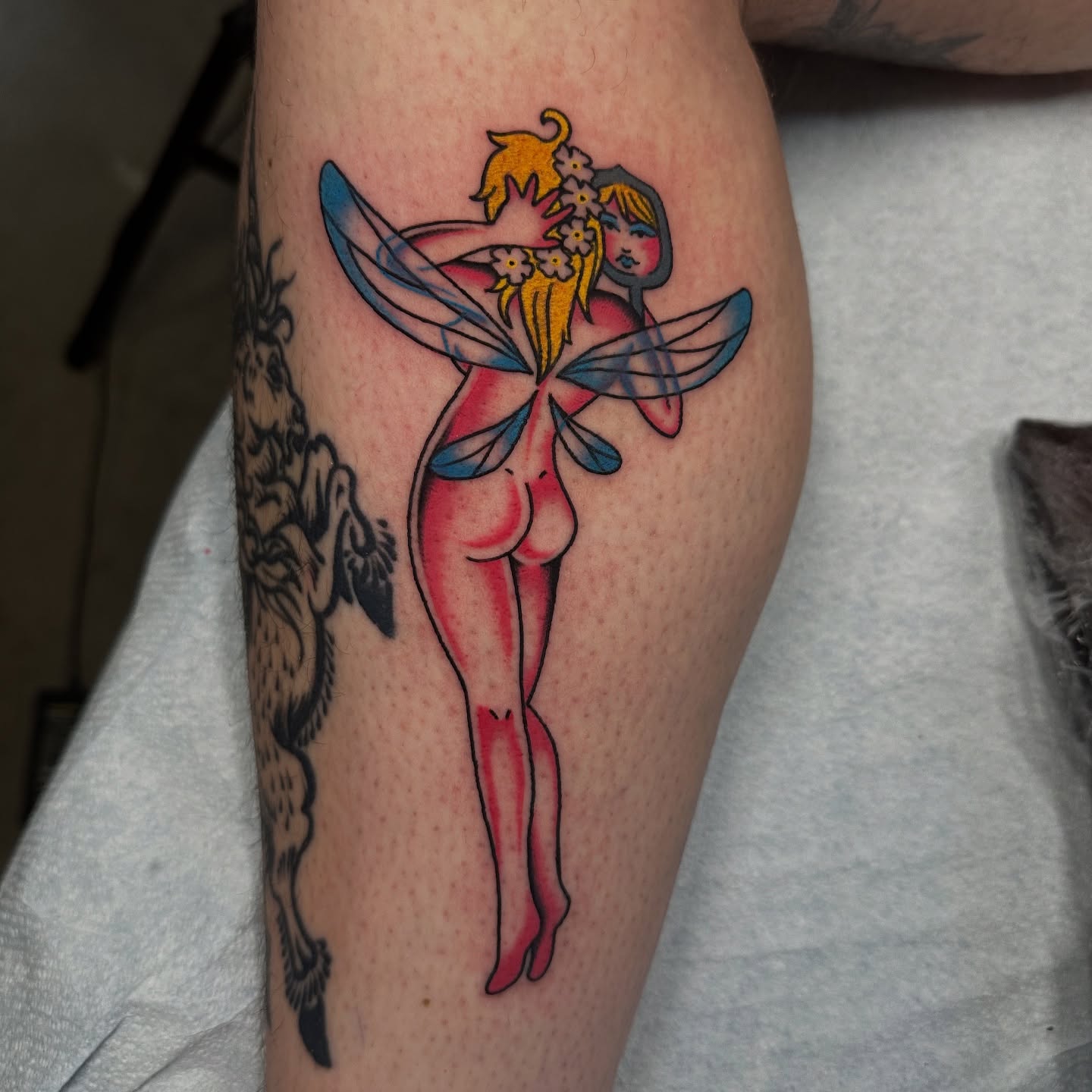 Fairy new school tattoo on the forearm by Emily Masa