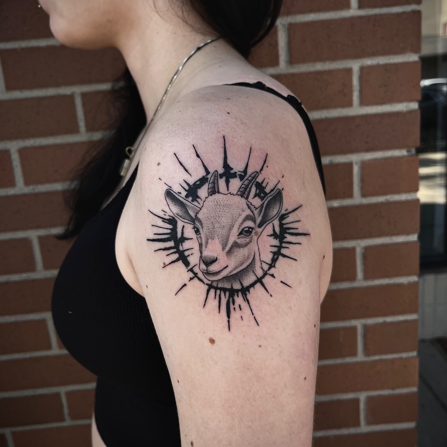 Goat head dotwork tattoo on the shoulder by Lauren Dempsey, Dearborn, Michigan