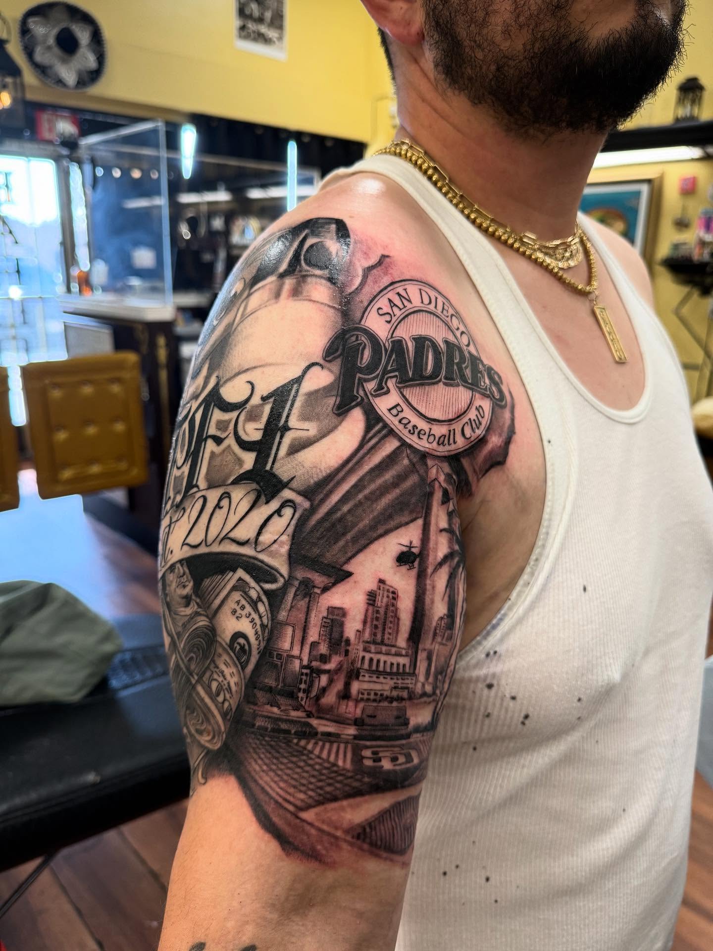 San Diego Padres black and grey tattoo on the upper arm by Tanner Pastor