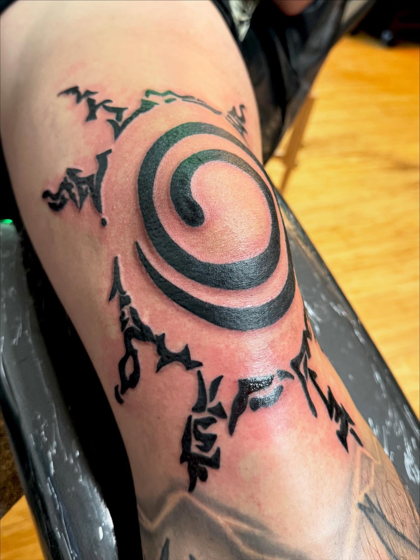 Spiral black and grey tattoo on the forearm by Austin Tattoo Artist, Austin, Texas