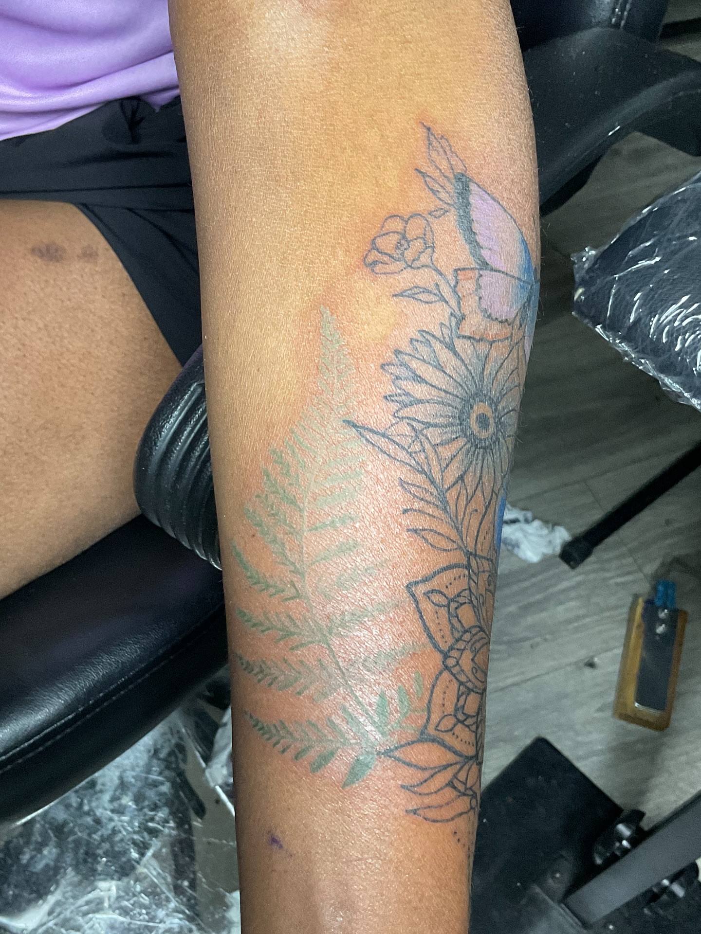 Floral arrangement black and grey tattoo on the forearm by Vanessa - Dallas Artist