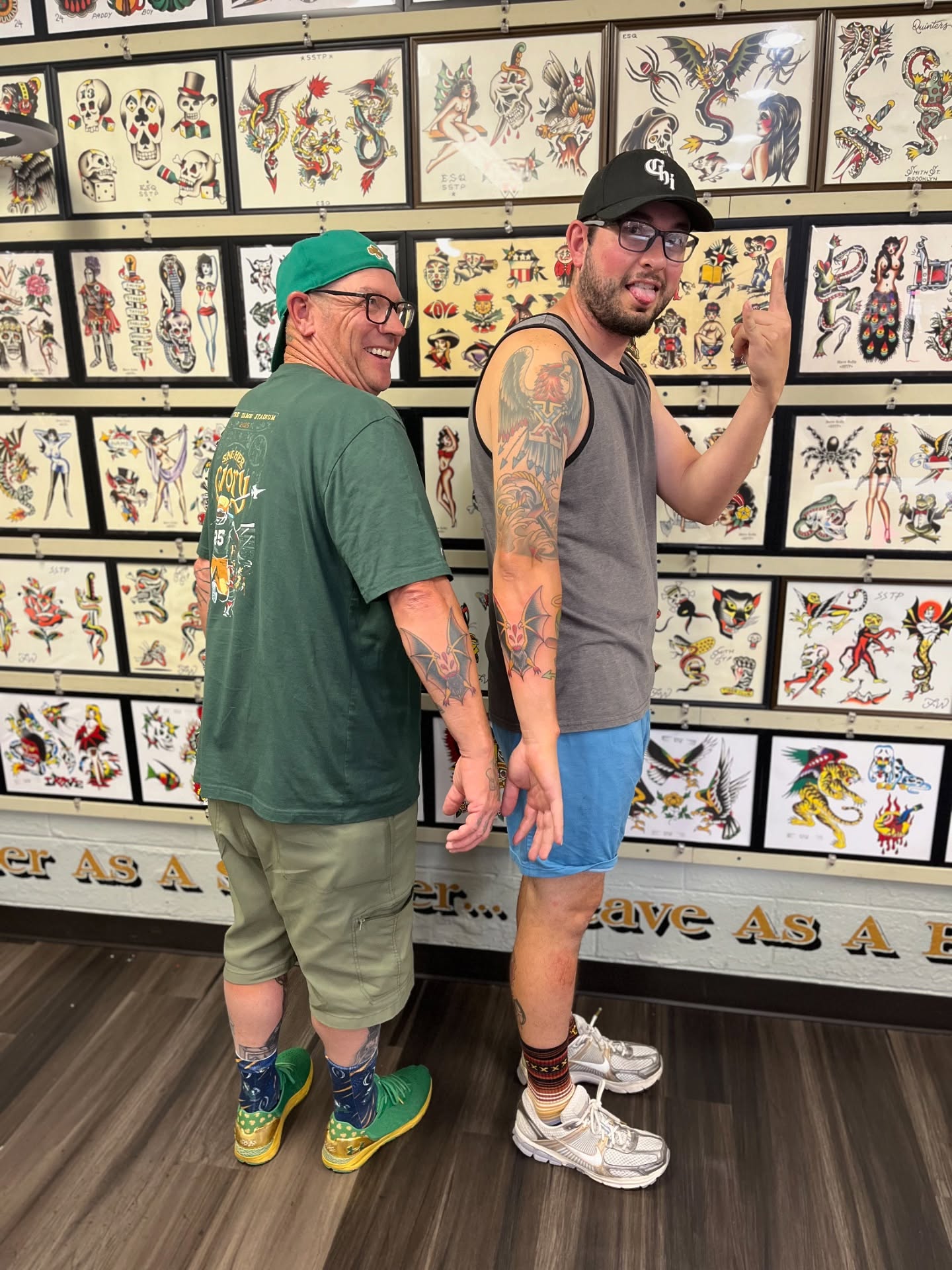 Tattooed arm American traditional tattoo on the upper arm by Tim Howell