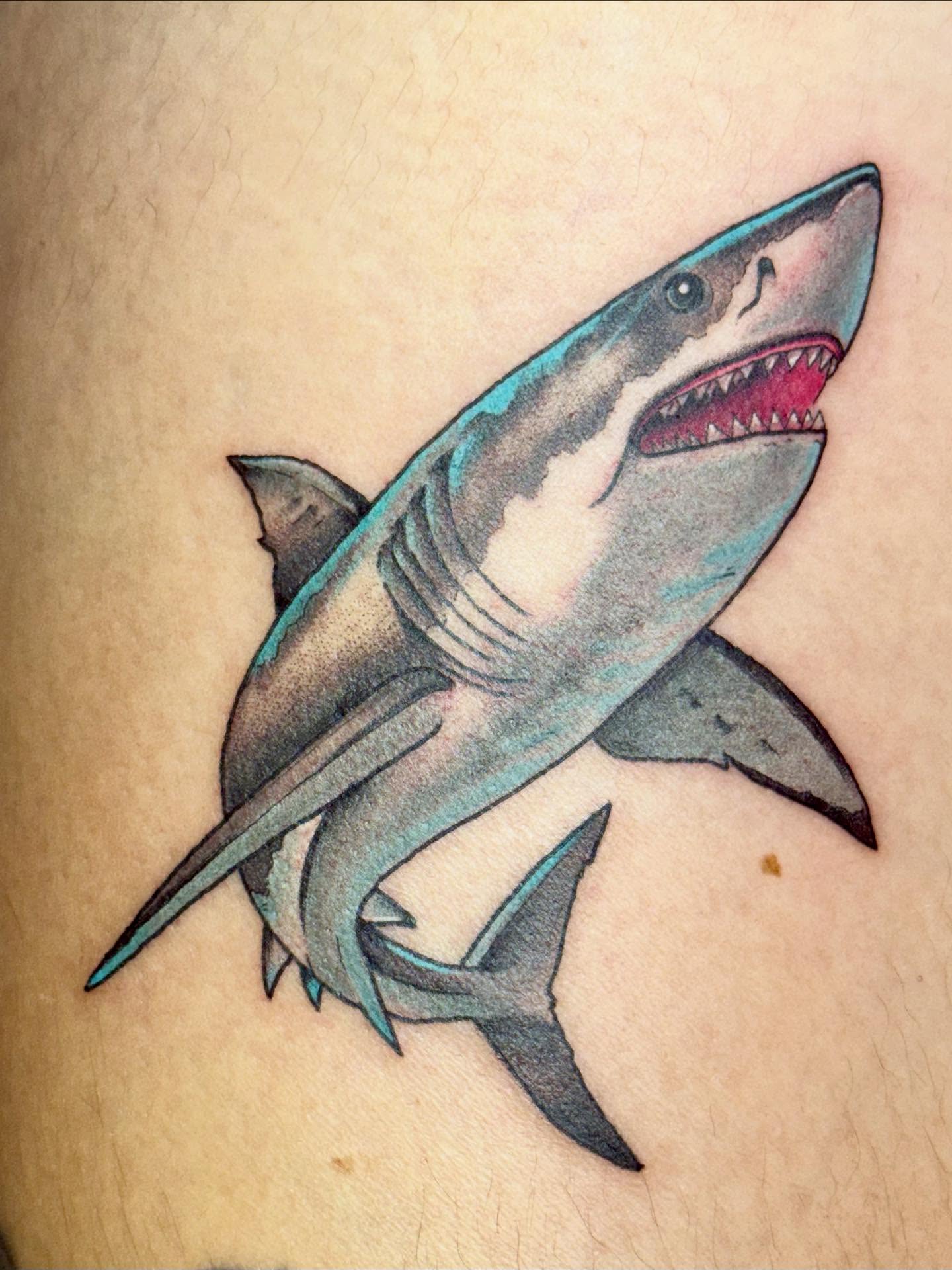 Shark American traditional tattoo on the thigh by Sophie McTear