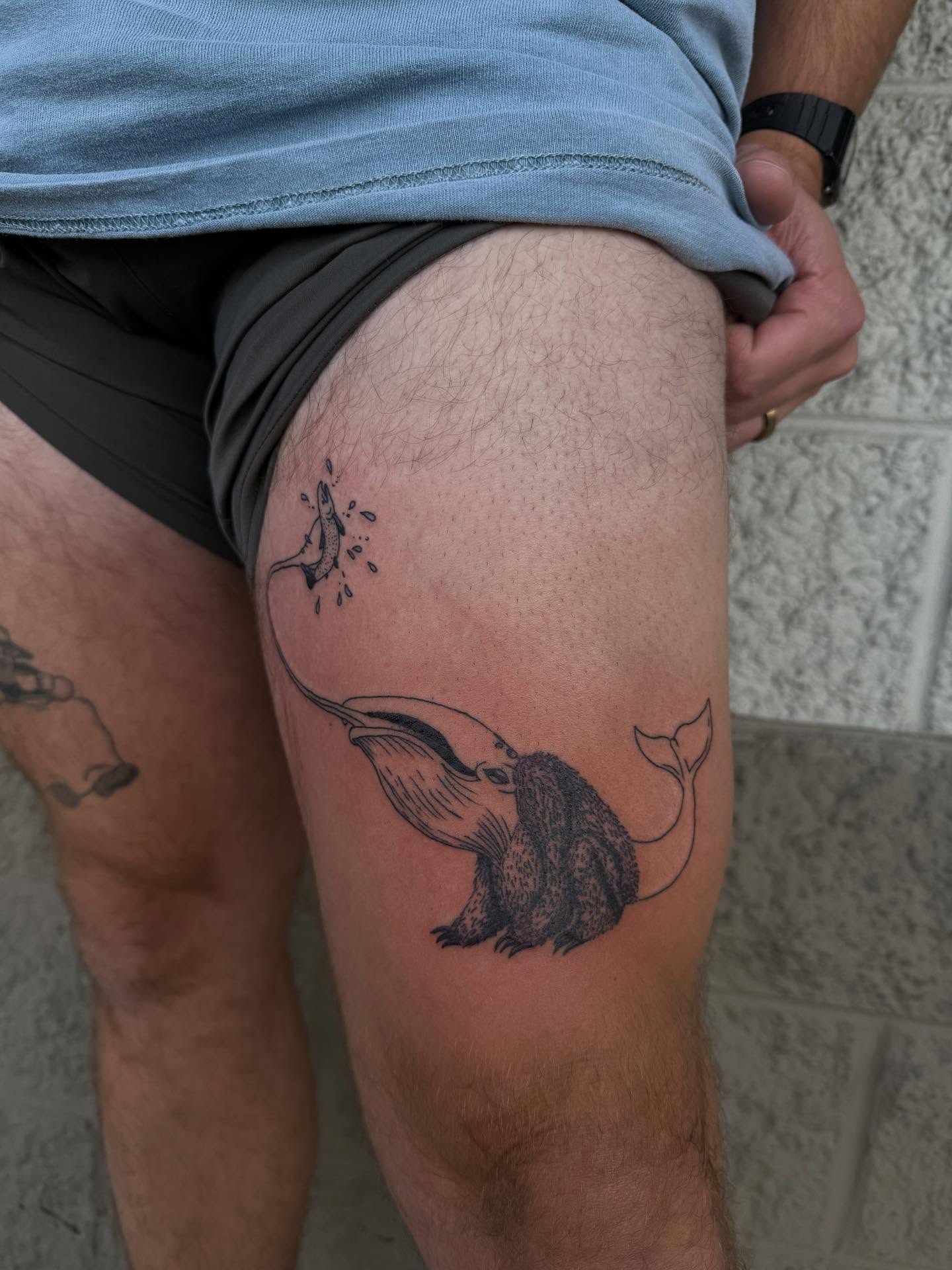Whale black and grey tattoo on the thigh by Kylee langford 🧿