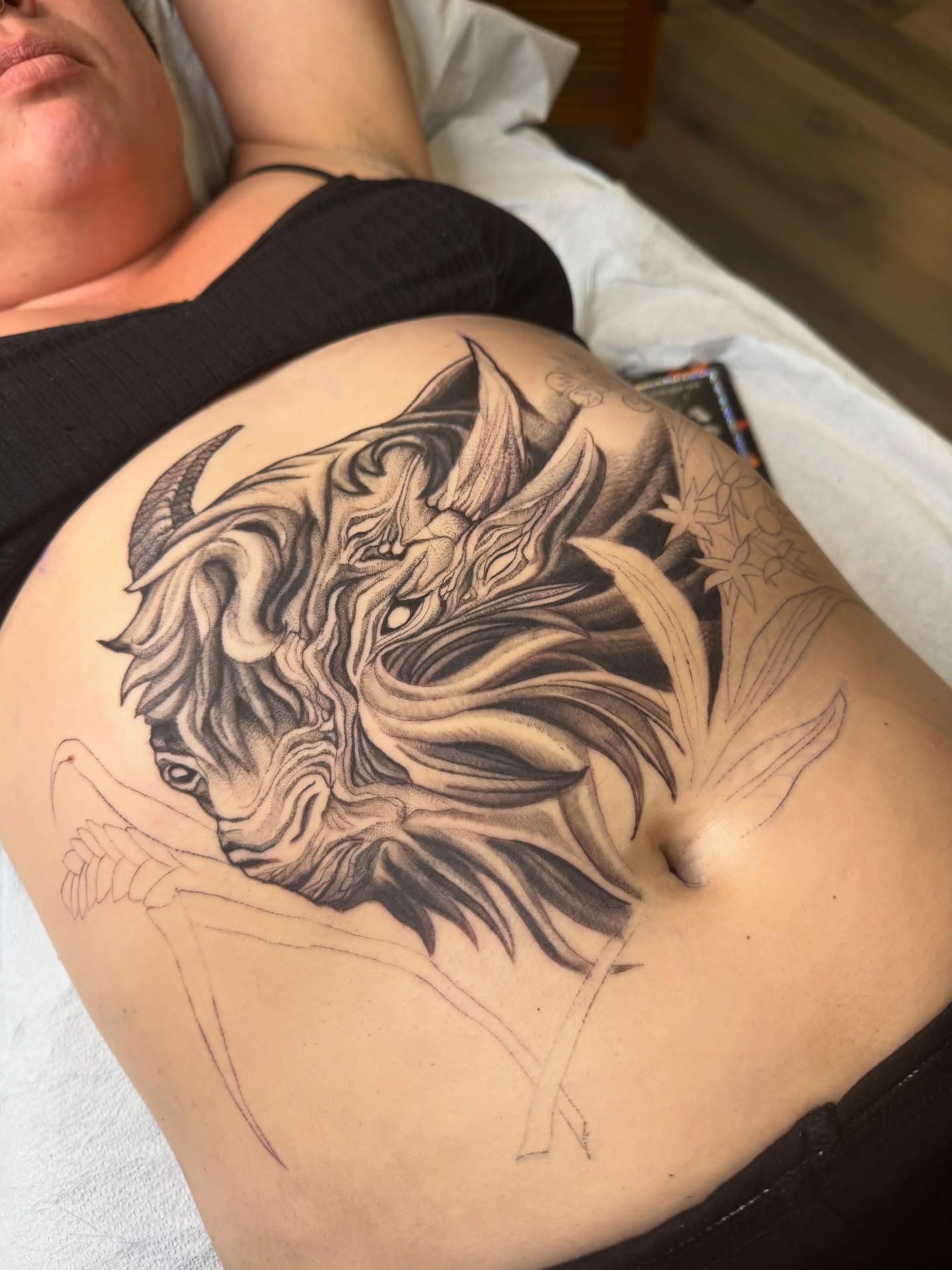 Bull black and grey tattoo on the thigh by Erick Mendivil