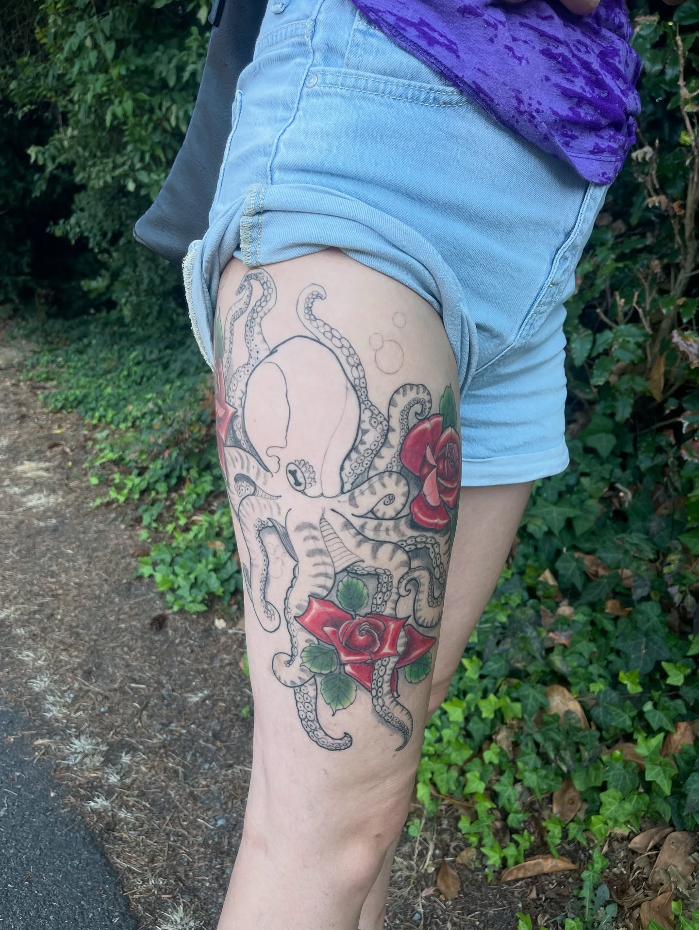 Octopus and rose American traditional tattoo on the thigh by ๐ต๐๐๐ ๐ฐ๐๐๐