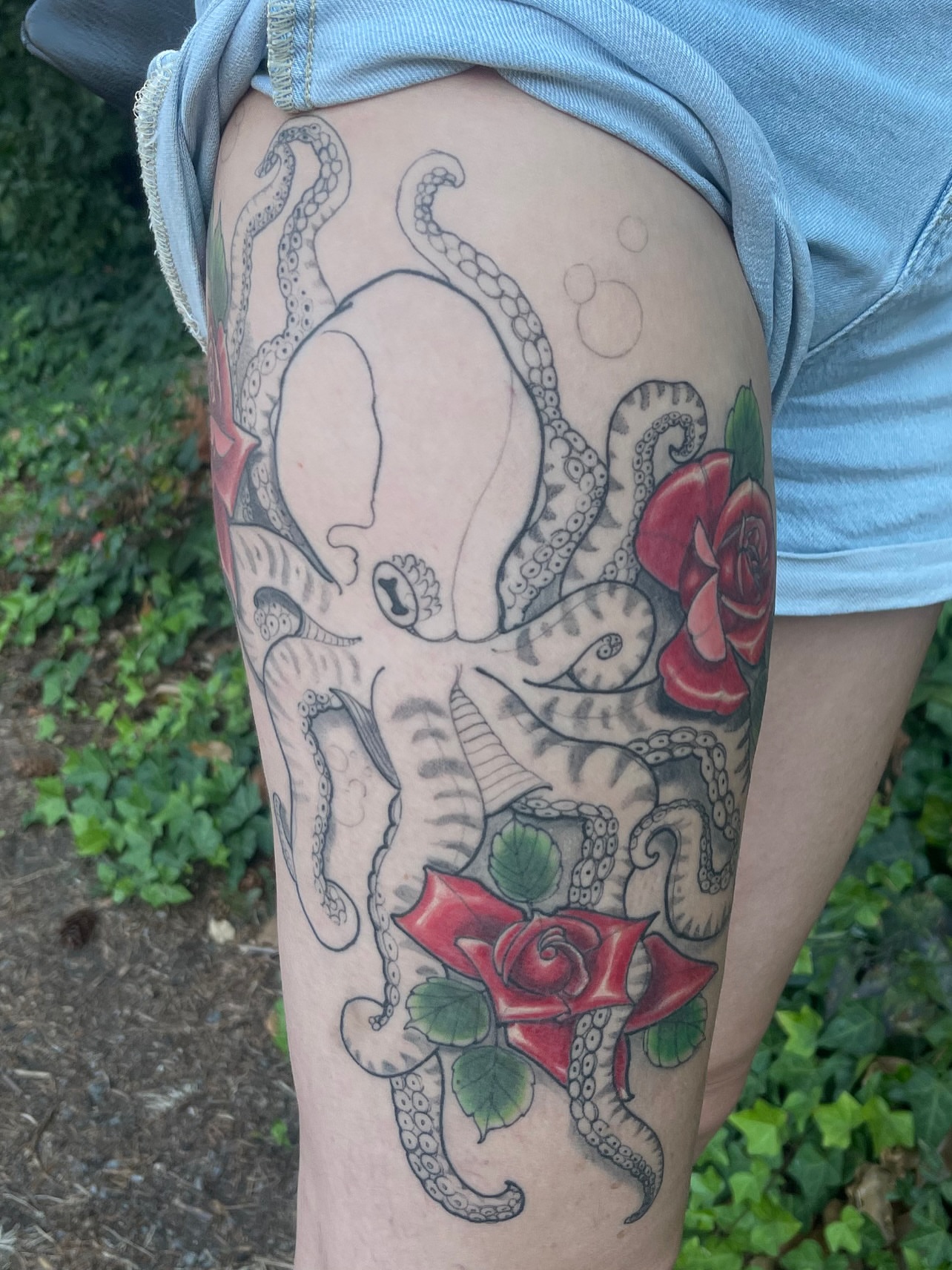 Octopus and roses American traditional tattoo on the thigh by ๐ต๐๐๐ ๐ฐ๐๐๐