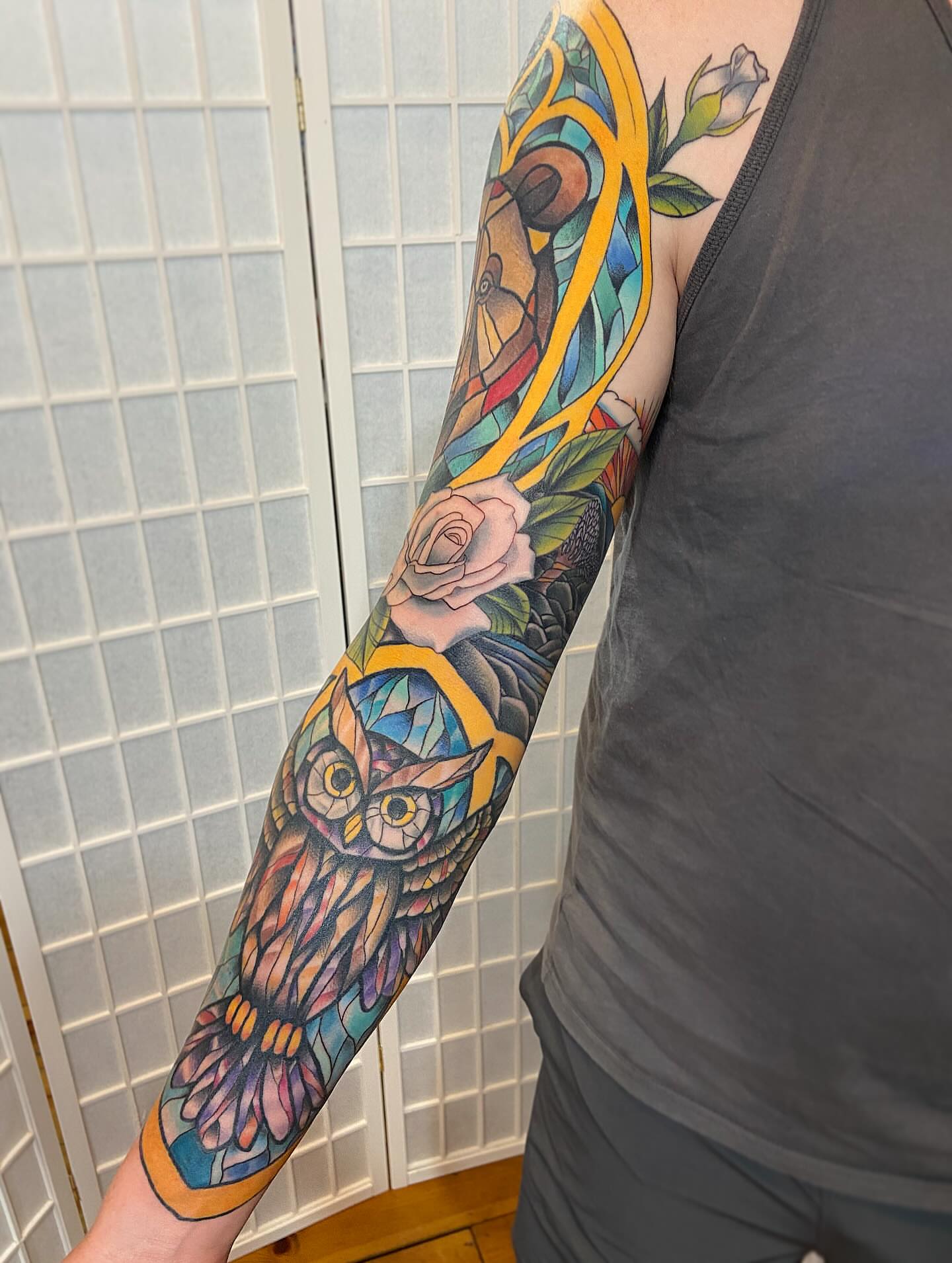 Owl and roses geometric tattoo on the forearm by Tattoos by Dale Hupke, Lebanon, Ohio