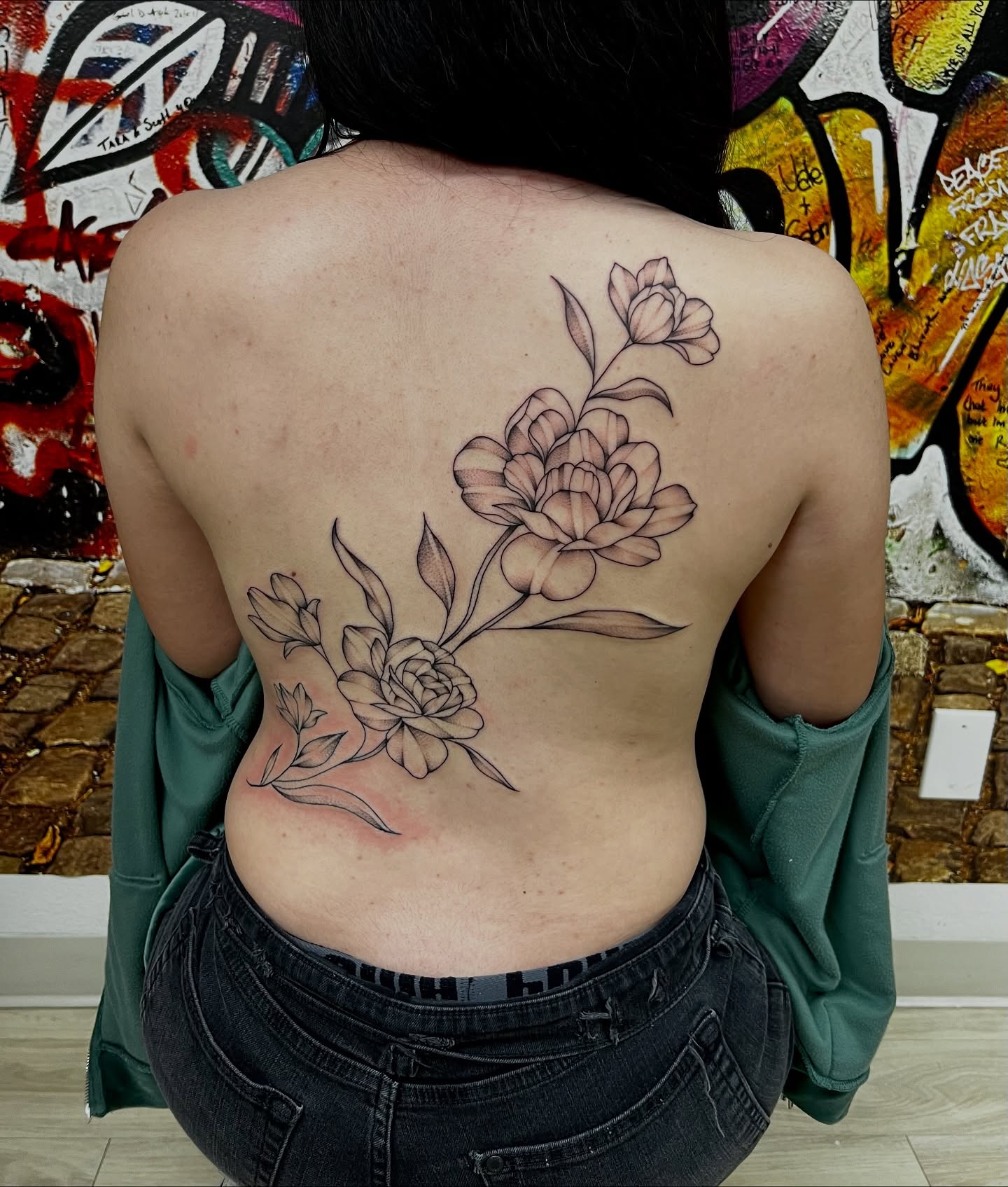 Floral arrangement black and grey tattoo on the back by Nadia ★