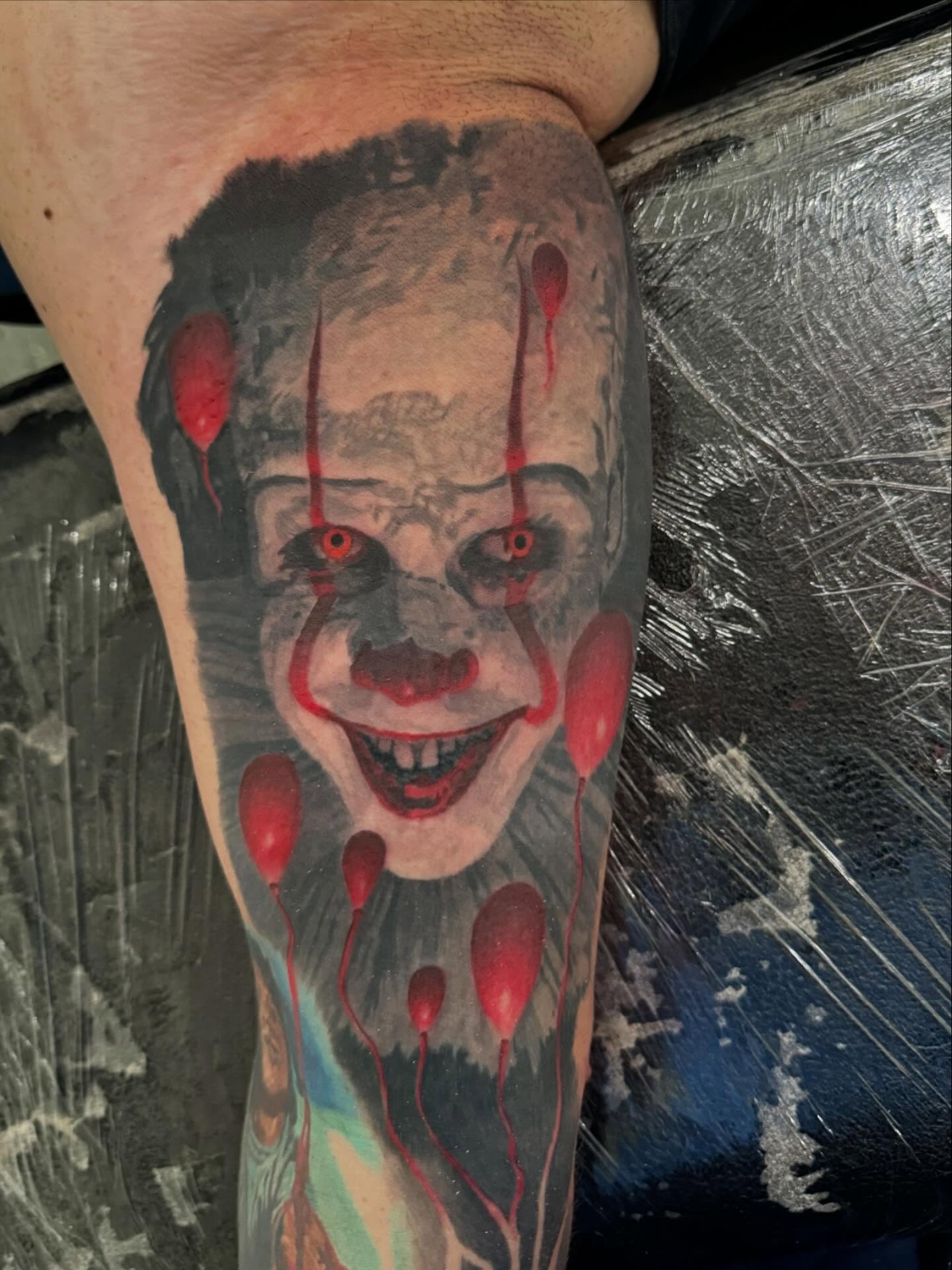 Clown realism tattoo on the forearm by marcus labonne