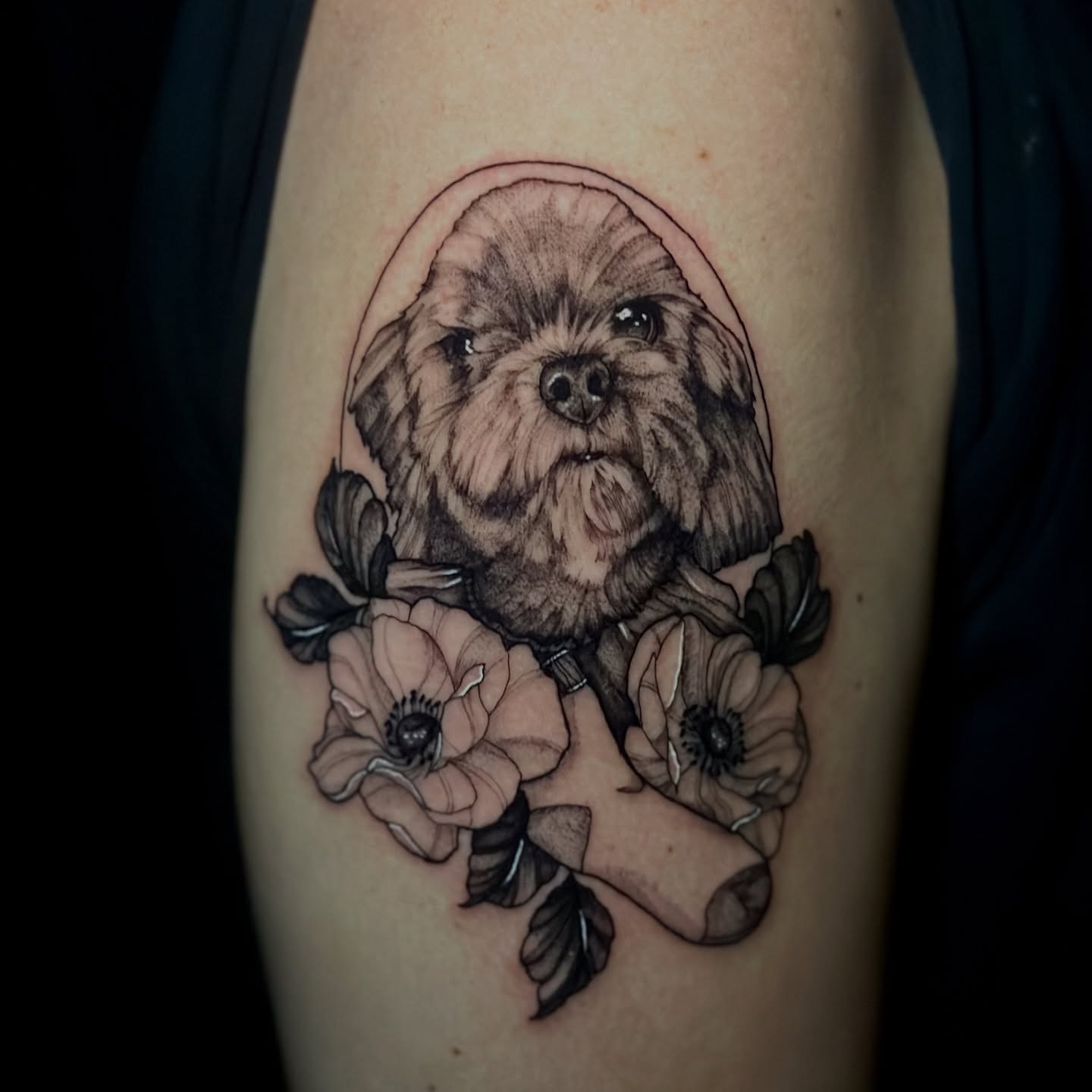 Dog with flowers realism tattoo on the thigh by Sabrina, Harrison, New Jersey