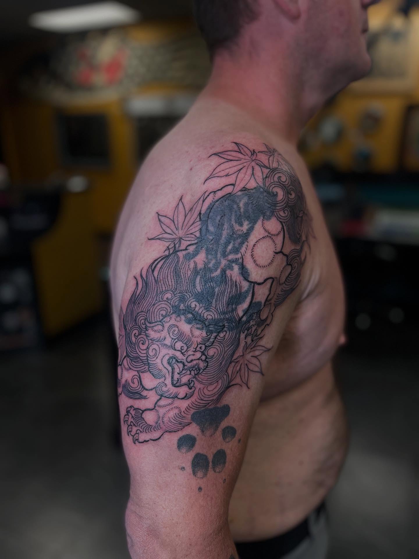 Lion and clouds dotwork tattoo on the shoulder by ๐ต๐๐๐ ๐ฐ๐๐๐