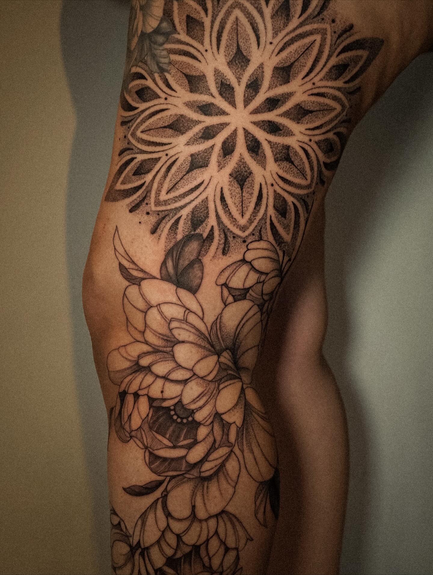 Floral mandala geometric tattoo on the calf by Katherin Plaza
