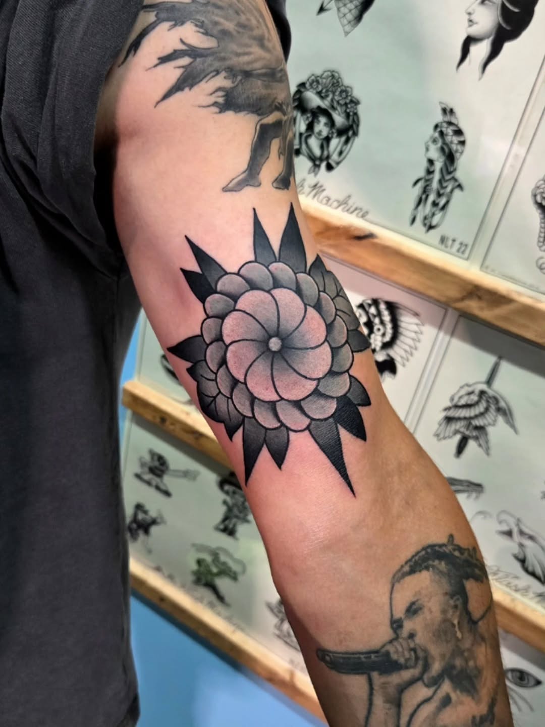 Flower American traditional tattoo on the forearm by Jake Lee
