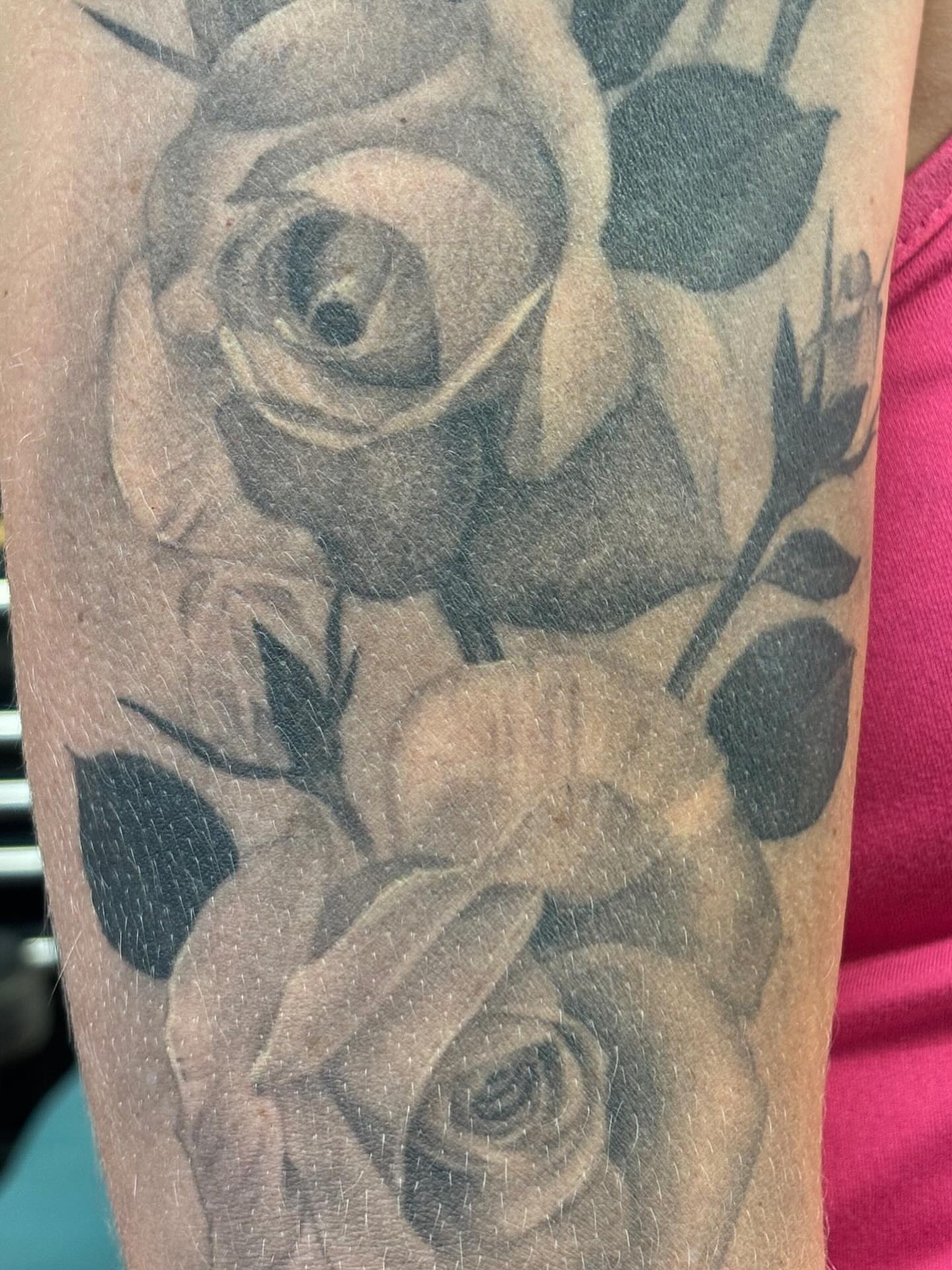 Roses black and grey tattoo on the forearm by Storm