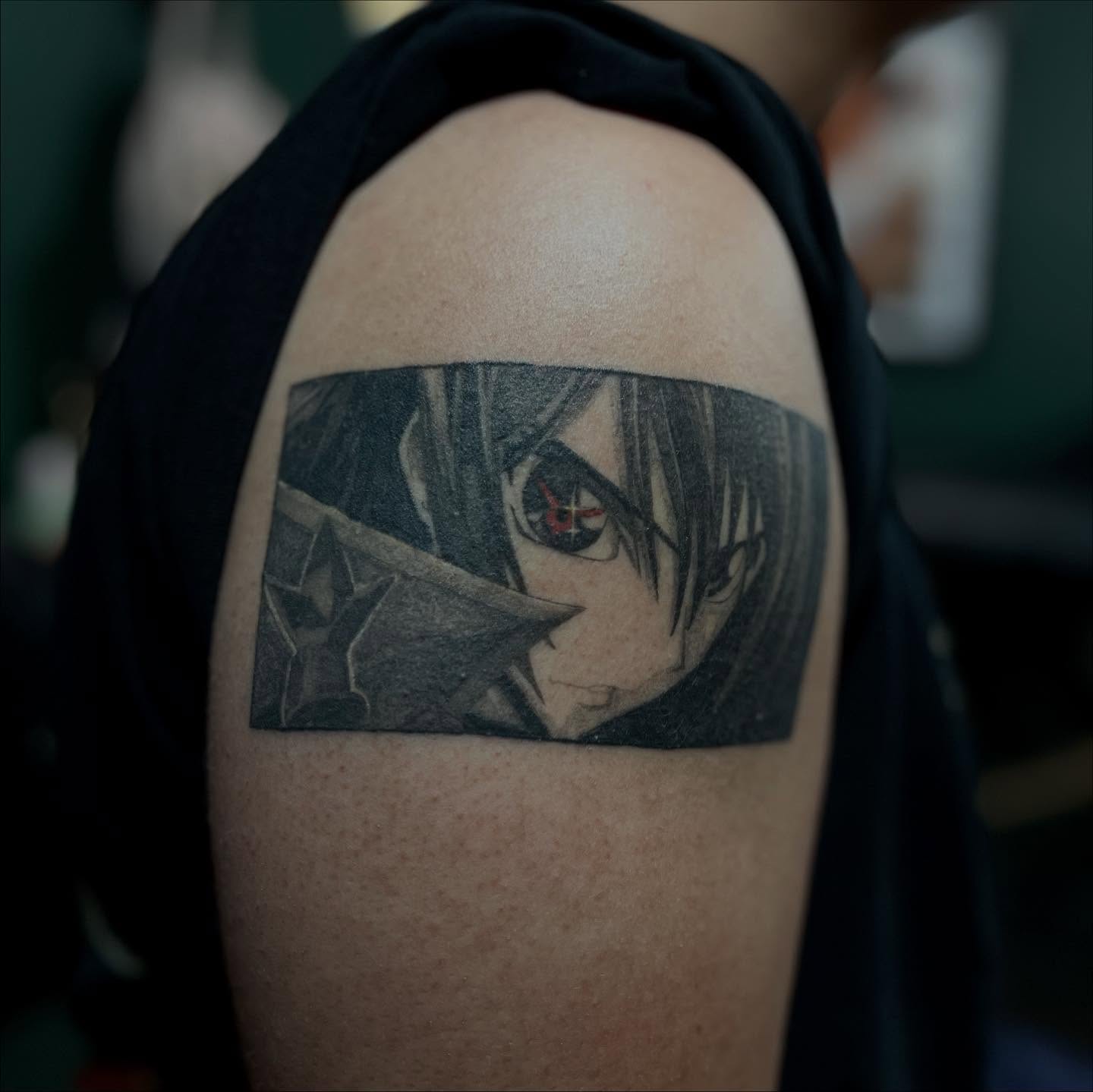 Anime character anime tattoo on the shoulder by 𝖑𝖎𝖑 𝖗𝖎𝖘𝖘