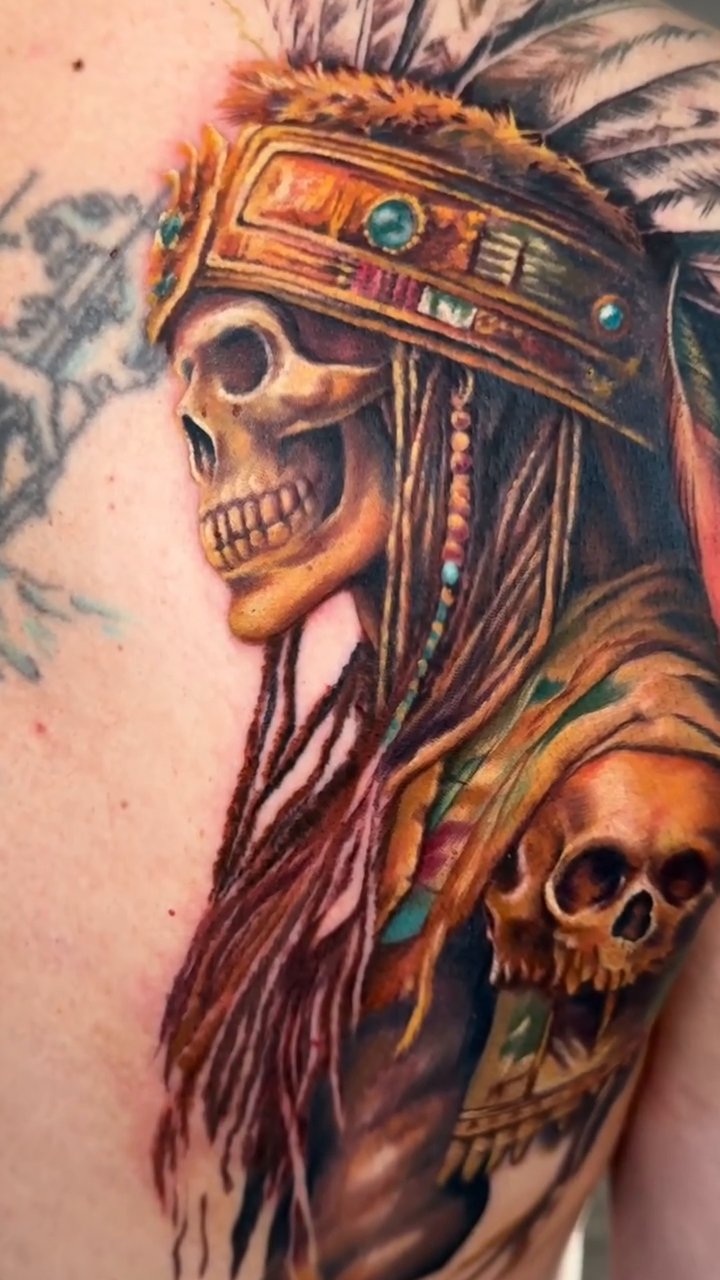 Native American skull warrior realism tattoo by Noelin Wheeler