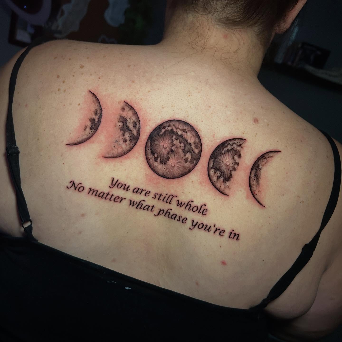 Moon phases black and grey tattoo on the back by Adrian Michigan Tattoo Artist