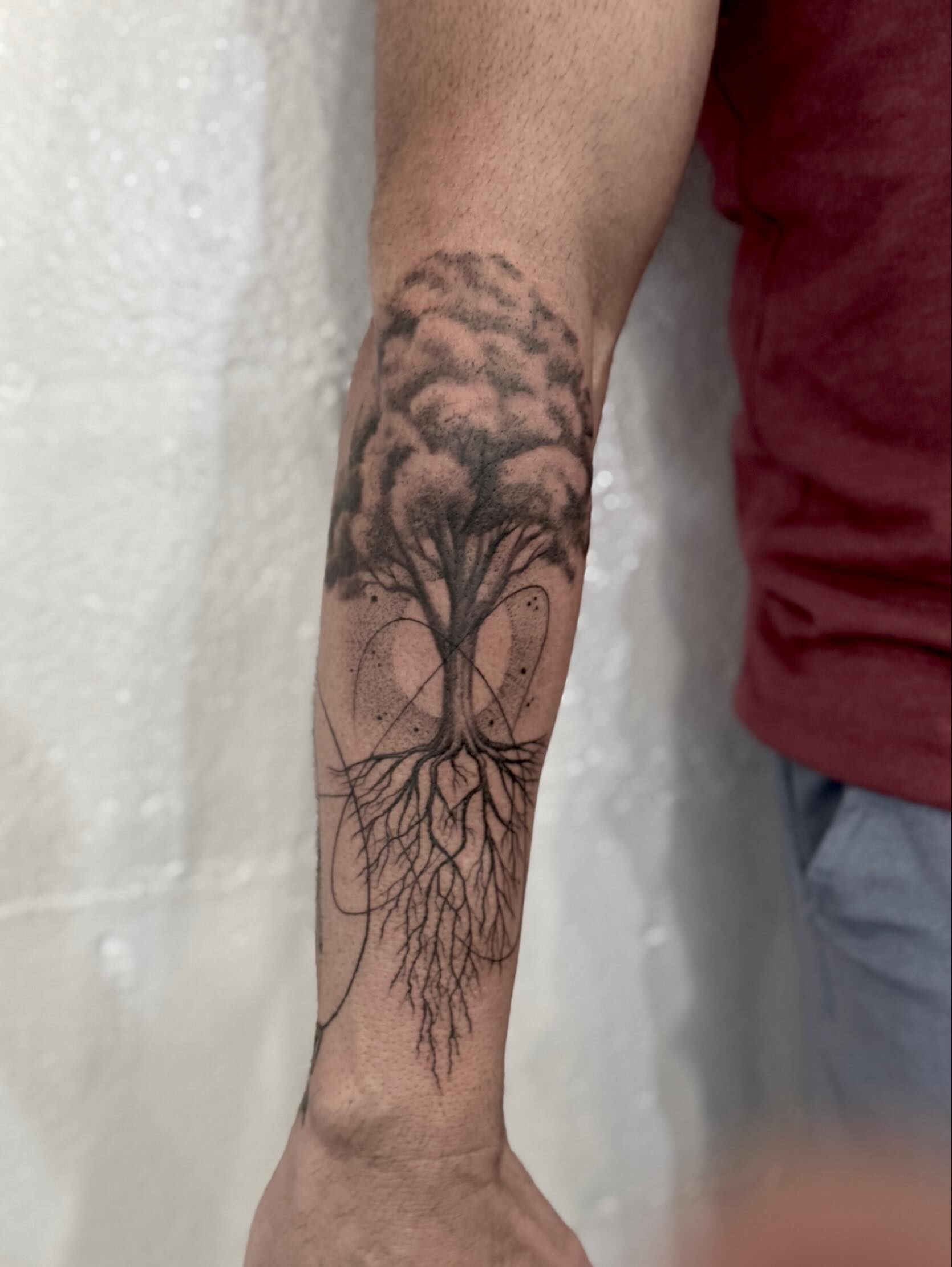 Tree black and grey tattoo on the forearm by Drew Foster, Toledo, Ohio