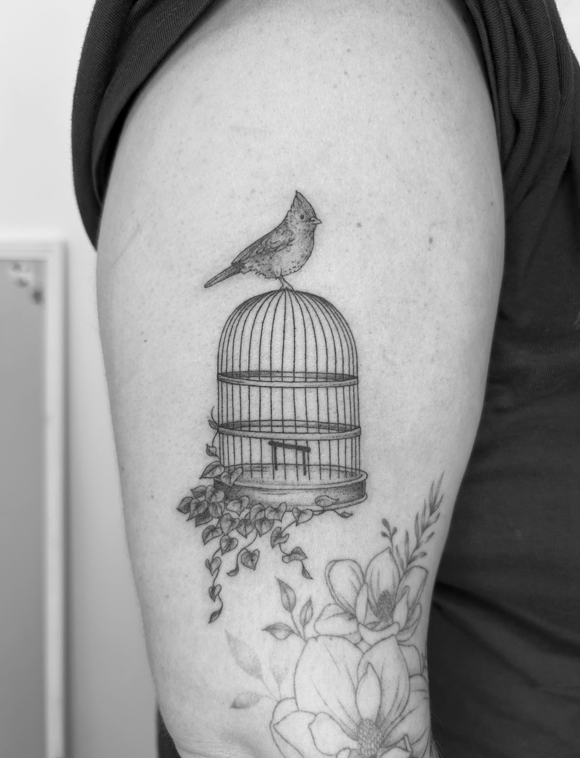 Bird in cage realism tattoo on the upper arm by ☆ Nashville Fine Line Tattoo Artist ☆