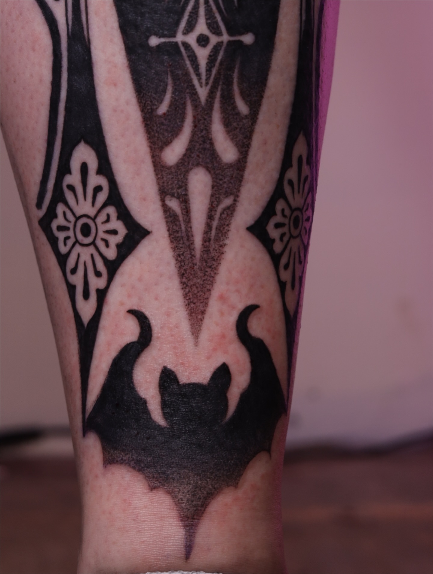 Bull horns tribal tattoo on the forearm by Caleb Ortiz