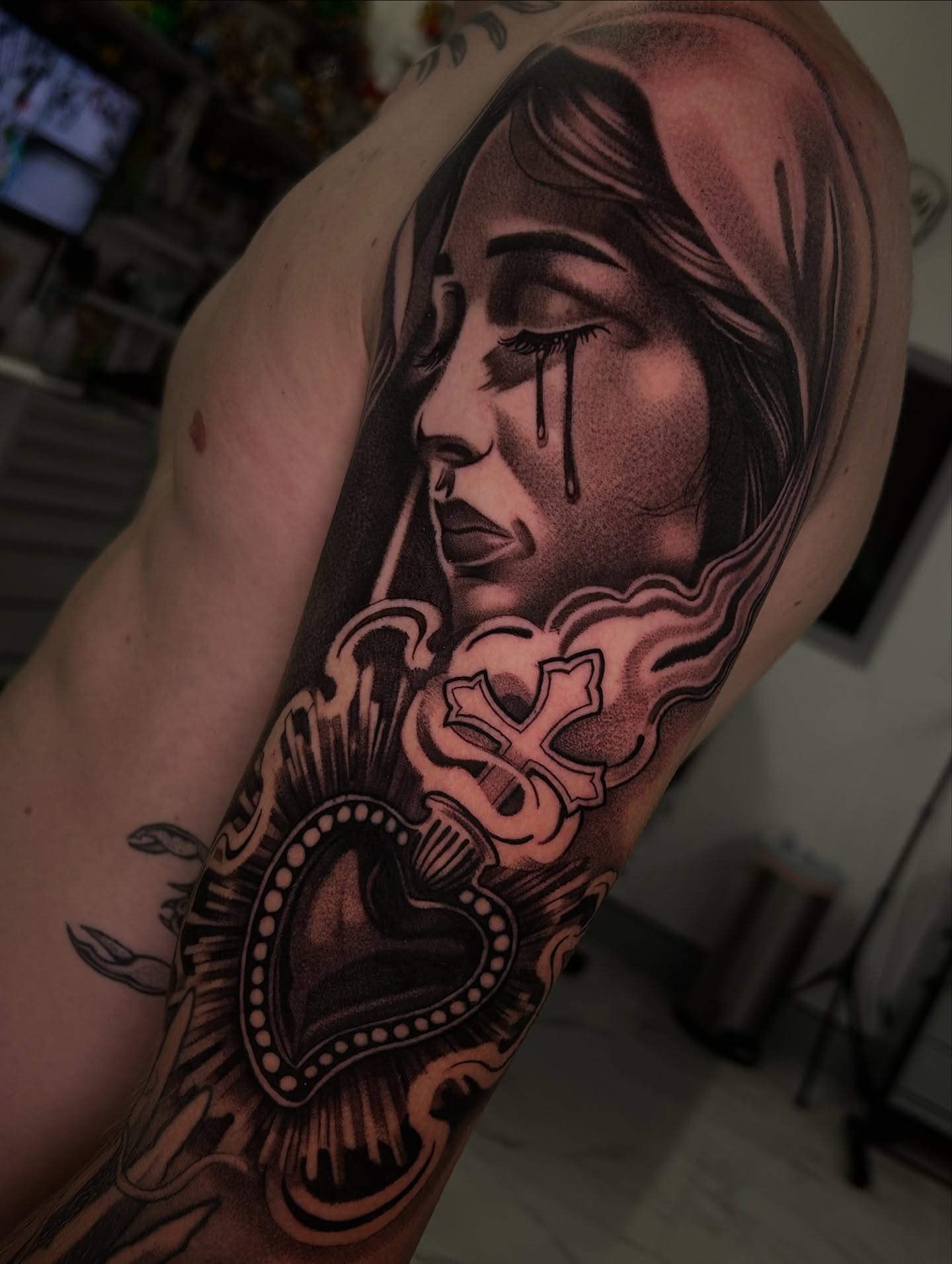 Weeping woman realism tattoo on the forearm by Jaylen - Atlanta Tattoo Artist