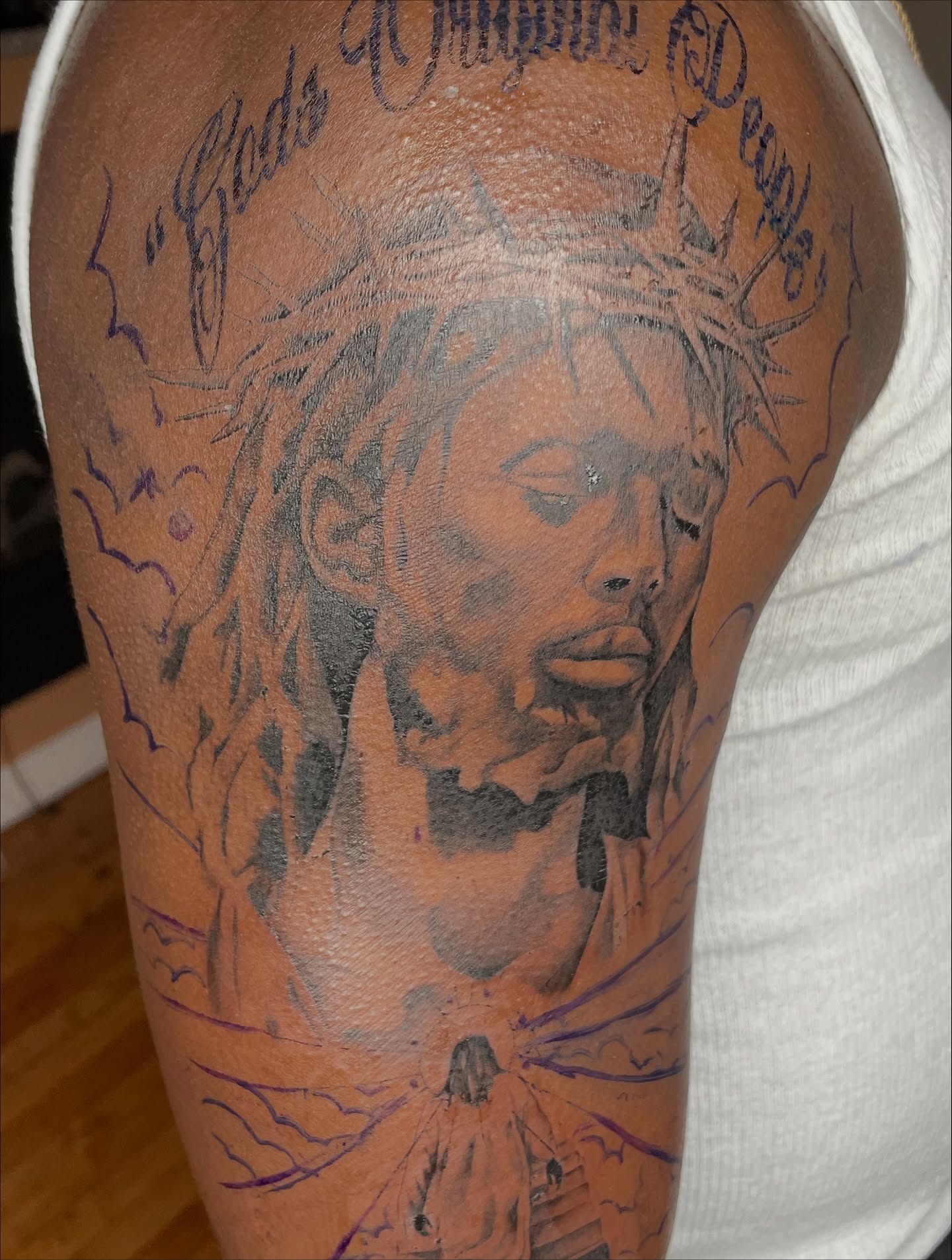 Jesus Christ realism tattoo on the forearm by Koolz