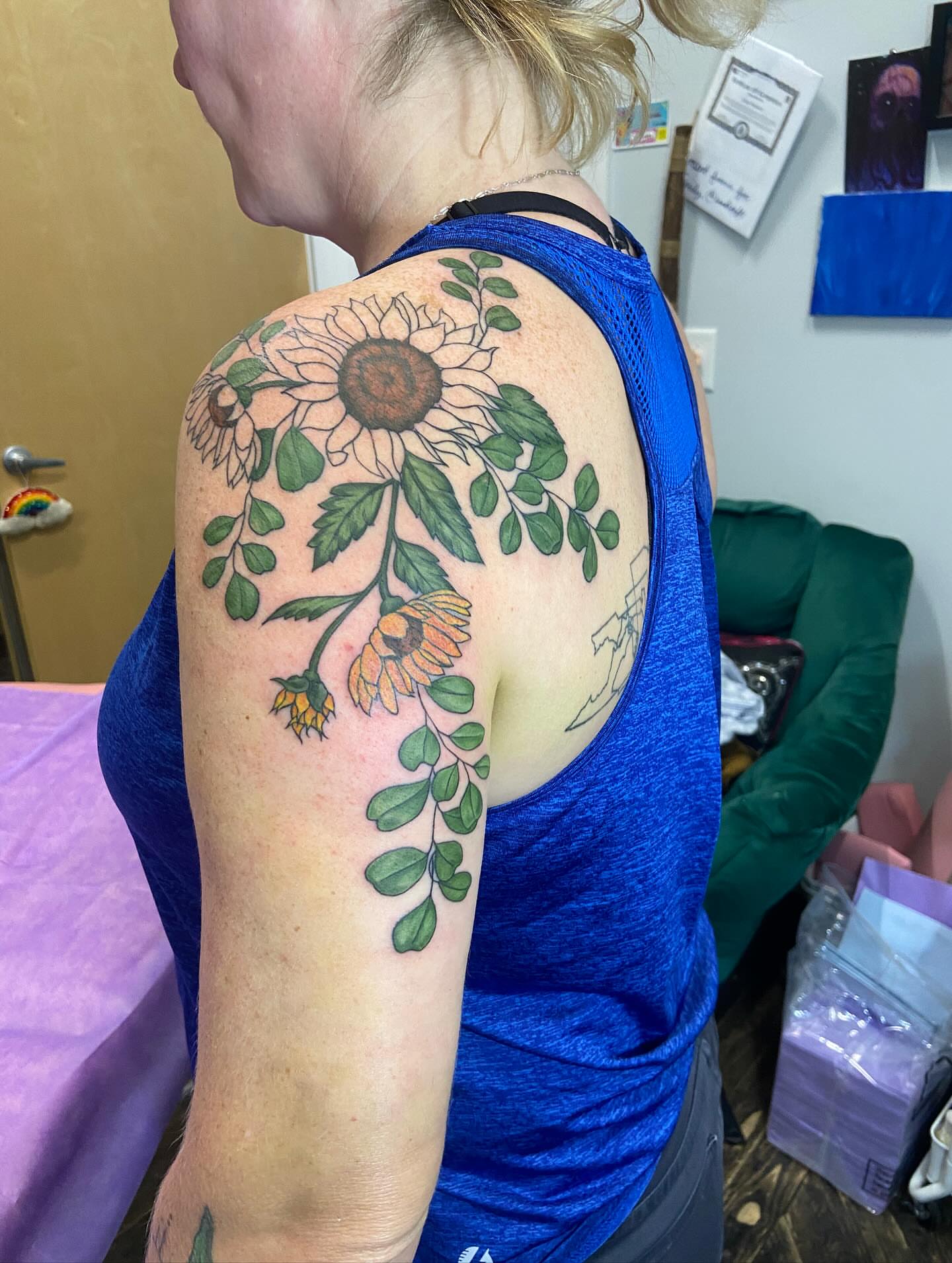 Sunflower bouquet realism tattoo on the shoulder by Dont Worry About It
