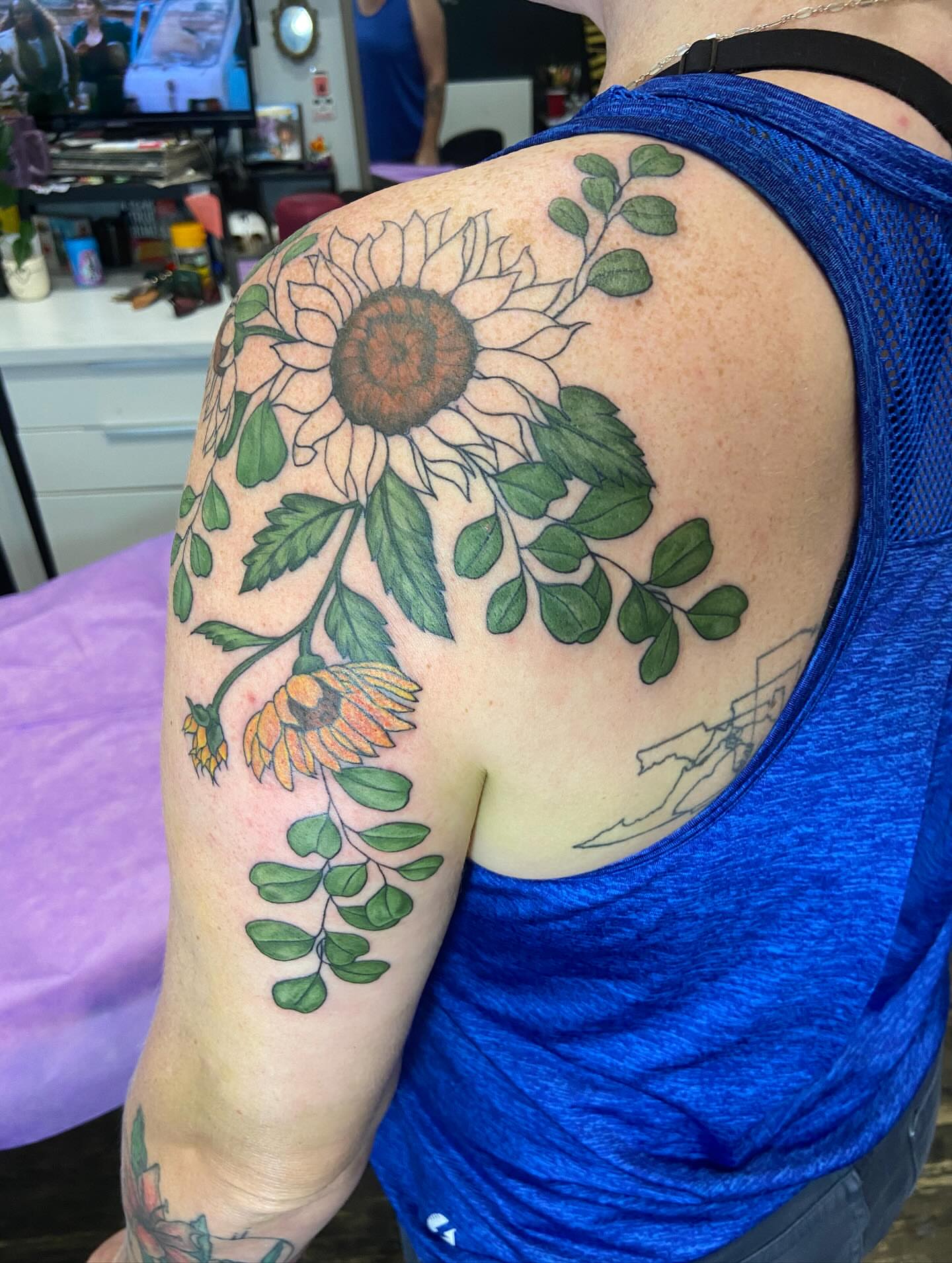 Sunflower realism tattoo on the shoulder by Dont Worry About It