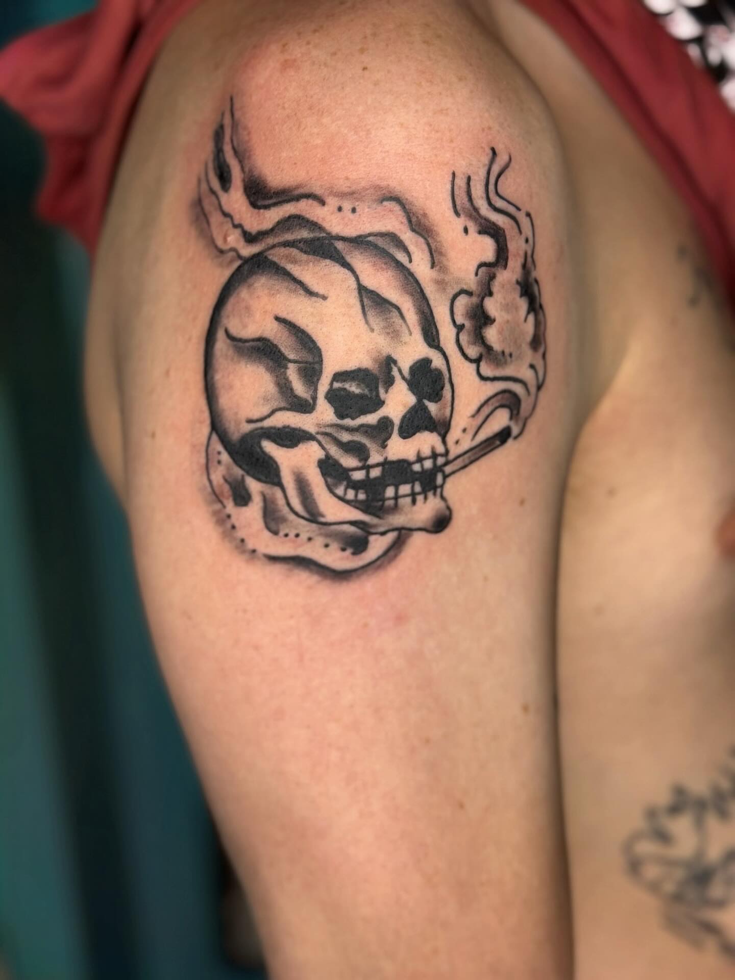 Smoking skull black and grey tattoo on the shoulder by @brocks_tatt_attic_, New Orleans, Louisiana