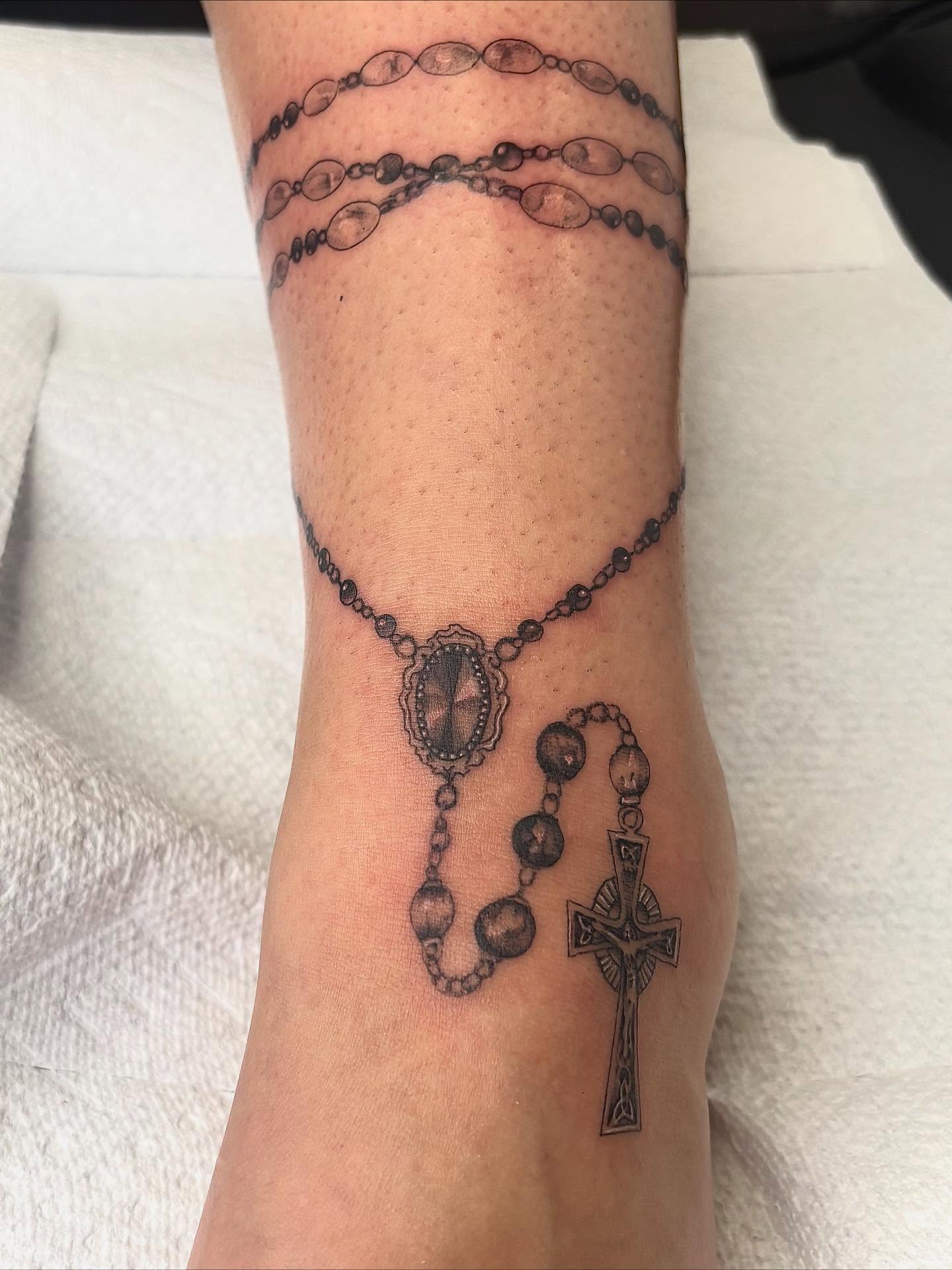 Rosary black and grey tattoo on the forearm by Harley Lane ๐ซ