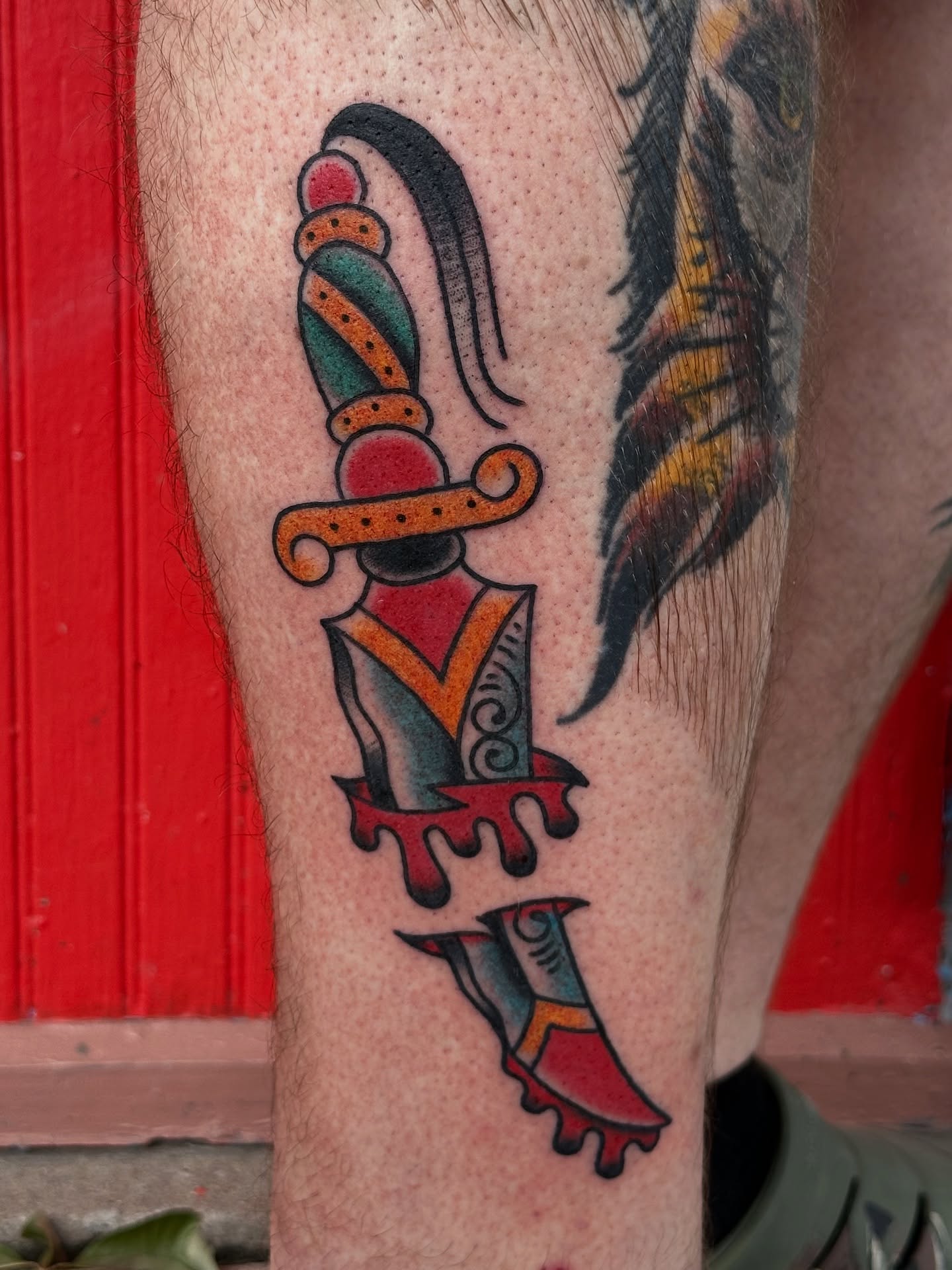 Knife American traditional tattoo on the forearm by Michael Williams