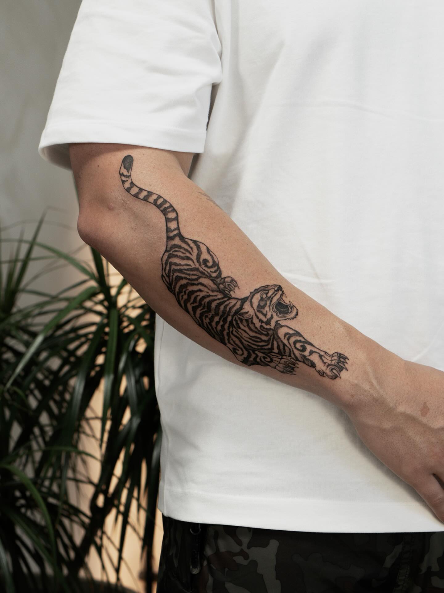 Tiger black and grey tattoo on the forearm by ᴛᴀᴛᴛᴏᴏ ᴀʀᴛɪꜱᴛ 📍Portland, OR