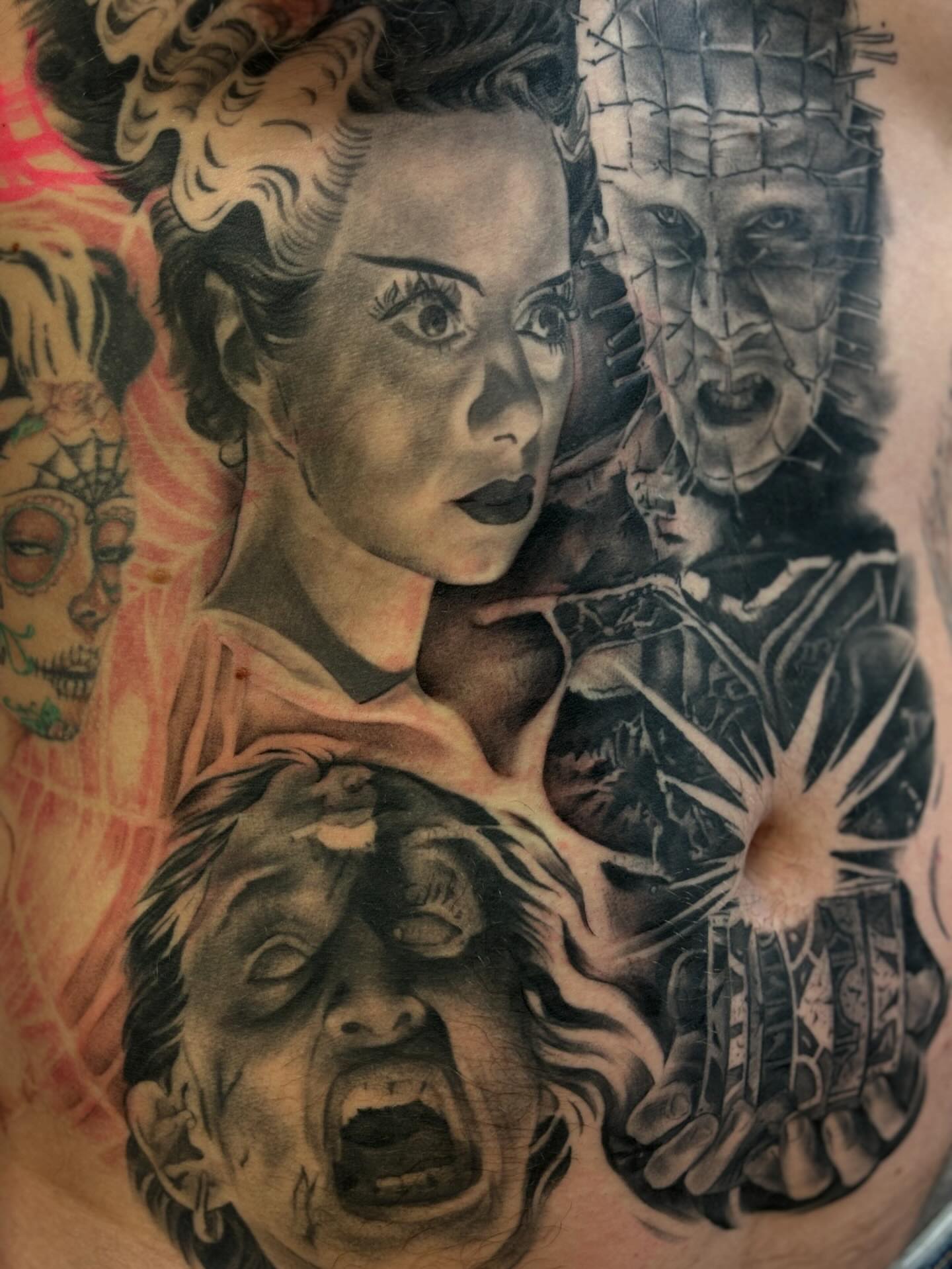 Horror characters realism tattoo on the torso by Storm