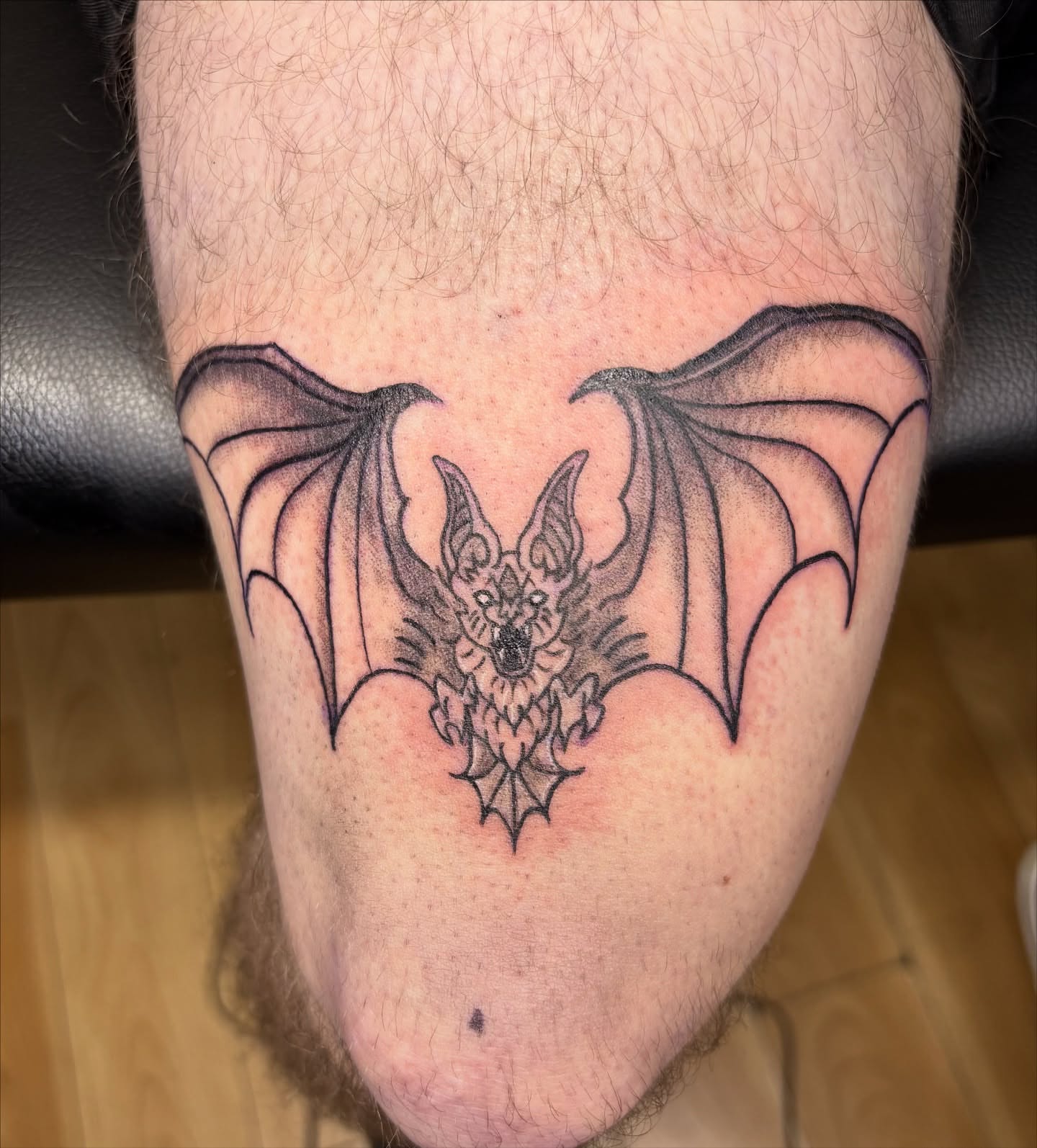 Bat black and grey tattoo on the thigh by Tori Anderson, Minneapolis, Minnesota