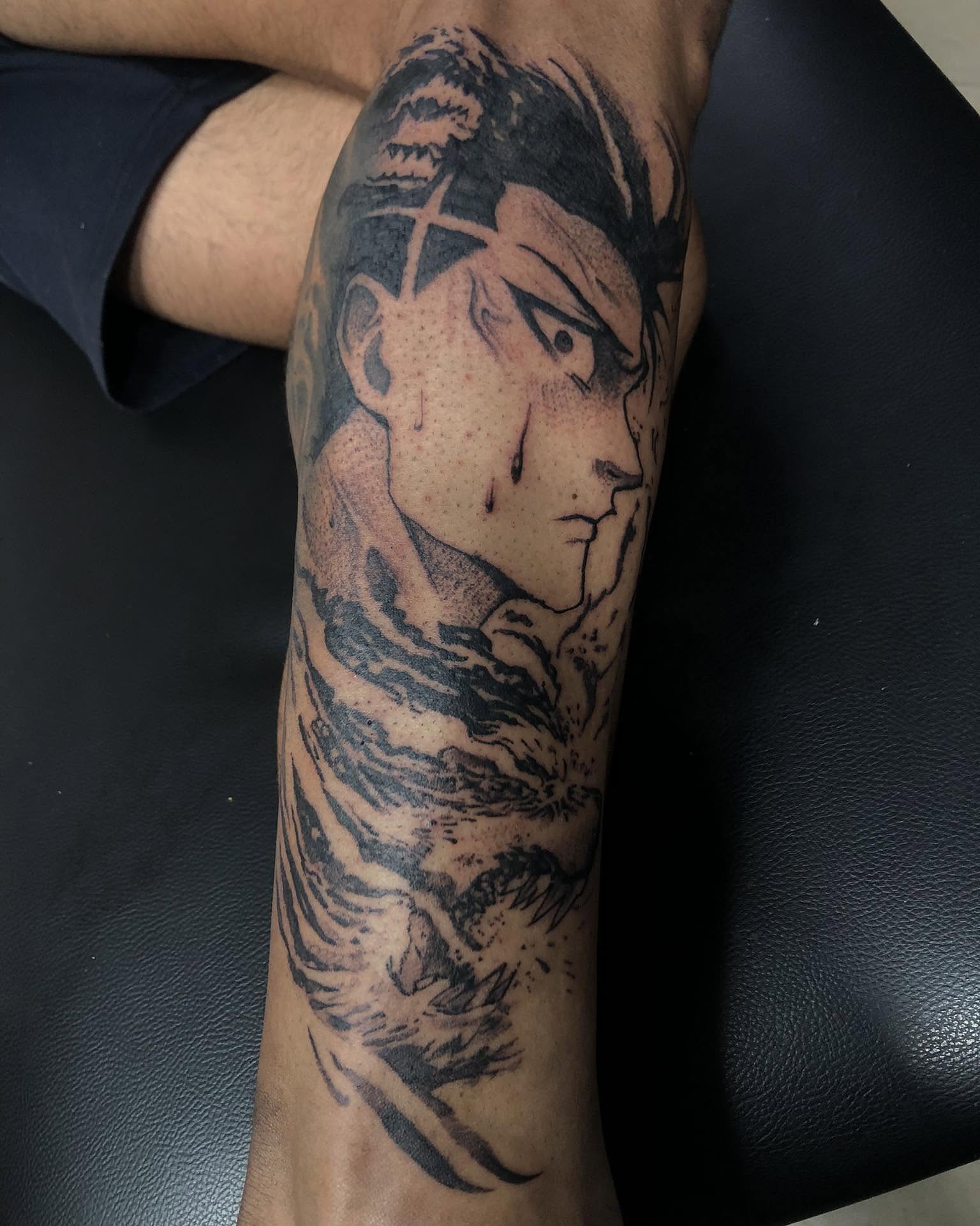 Anime character anime tattoo on the forearm by Tattooart-gotha, Juchitan, Oaxaca, Mexico